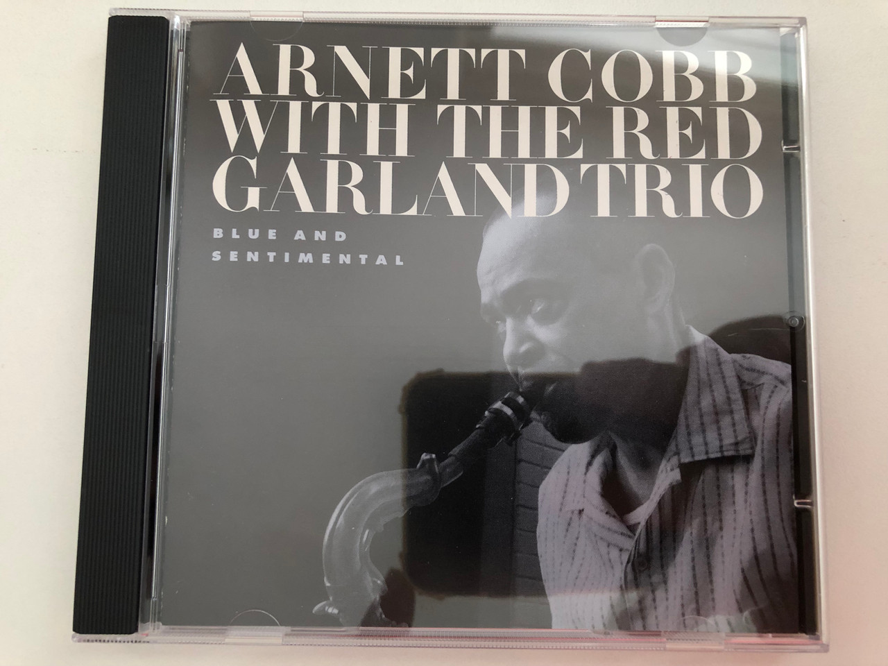https://cdn10.bigcommerce.com/s-62bdpkt7pb/products/0/images/276247/Arnett_Cobb_With_The_Red_Garland_Trio_-_Blue_And_Sentimental_ZYX-Music_Audio_CD_Stereo_PCD_24122-2_1__59993.1686321371.1280.1280.JPG?c=2&_gl=1*g80pau*_ga*MjA2NTIxMjE2MC4xNTkwNTEyNTMy*_ga_WS2VZYPC6G*MTY4NjMyMDY5Mi45MzUuMS4xNjg2MzIxMzc0LjYwLjAuMA..