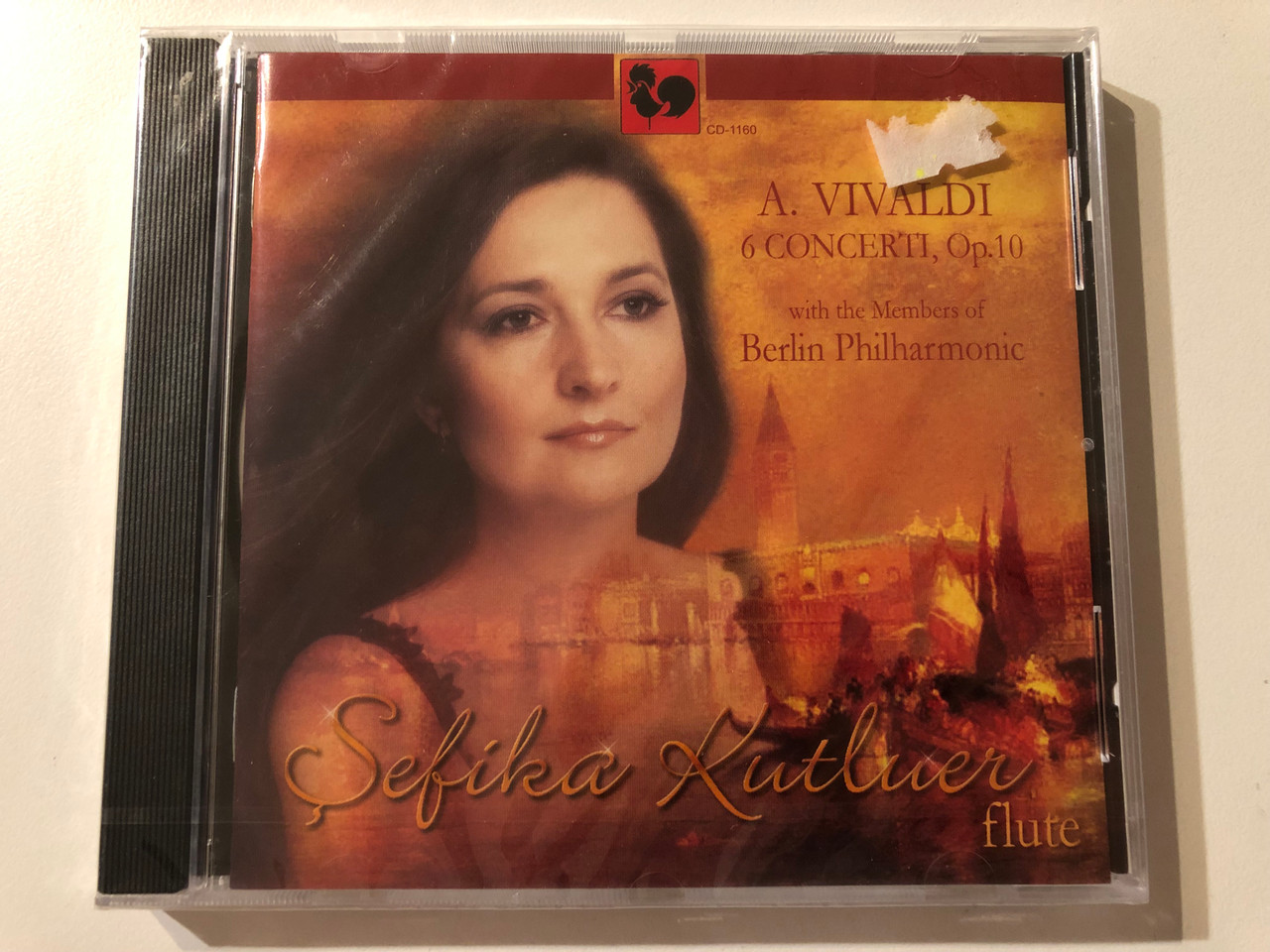 https://cdn10.bigcommerce.com/s-62bdpkt7pb/products/0/images/276330/A._Vivaldi_6_Concerti_Op._10_with_the_Members_of_Berlin_Philharmonic_-_Sefika_Kutluer_flute_VDE-GALLO_Audio_CD_2005_CD-1180_1__19745.1686550061.1280.1280.JPG?c=2&_gl=1*oupvrc*_ga*MjA2NTIxMjE2MC4xNTkwNTEyNTMy*_ga_WS2VZYPC6G*MTY4NjU0OTU5MC45MzcuMS4xNjg2NTUwMDYyLjYwLjAuMA..
