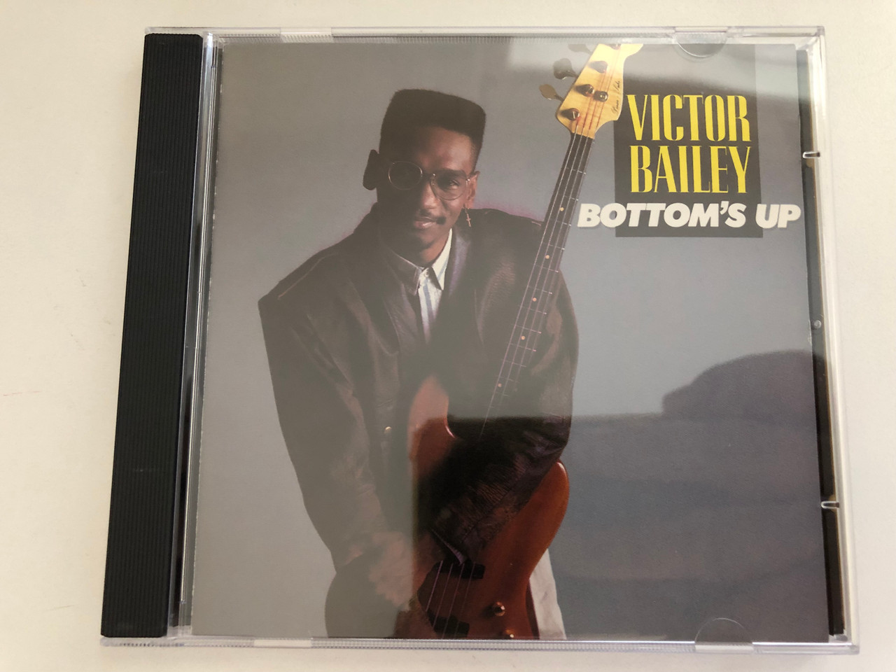 https://cdn10.bigcommerce.com/s-62bdpkt7pb/products/0/images/276351/Victor_Bailey_Bottoms_Up_Atlantic_Audio_CD_1989_781_978-2_1__41900.1686554654.1280.1280.JPG?c=2&_gl=1*1qjpfun*_ga*MjA2NTIxMjE2MC4xNTkwNTEyNTMy*_ga_WS2VZYPC6G*MTY4NjU0OTU5MC45MzcuMS4xNjg2NTU0NjE4LjYwLjAuMA..