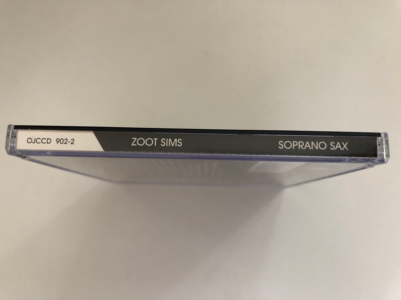 https://cdn10.bigcommerce.com/s-62bdpkt7pb/products/0/images/276356/Zoot_Sims_-_Soprano_Sax_Original_Jazz_Classics_Audio_CD_Stereo_1996_OJCCD_902-2_3__56946.1686555023.1280.1280.JPG?c=2&_gl=1*bnmwji*_ga*MjA2NTIxMjE2MC4xNTkwNTEyNTMy*_ga_WS2VZYPC6G*MTY4NjU0OTU5MC45MzcuMS4xNjg2NTU0ODc1LjM3LjAuMA..