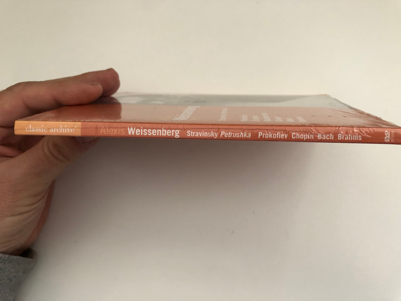 https://cdn10.bigcommerce.com/s-62bdpkt7pb/products/0/images/277181/Stravinsky_Prokofiev_Scriabin_Rachmaninov_Chopin_Bach_Brahms_Alexis_Weissenberg_-_Classic_Archive_Bonus_Alexis_Weissenberg_talks_about_Petrushka_Medici_Art_DVD_899132_1__83376.1687235323.1280.1280.JPG?c=2