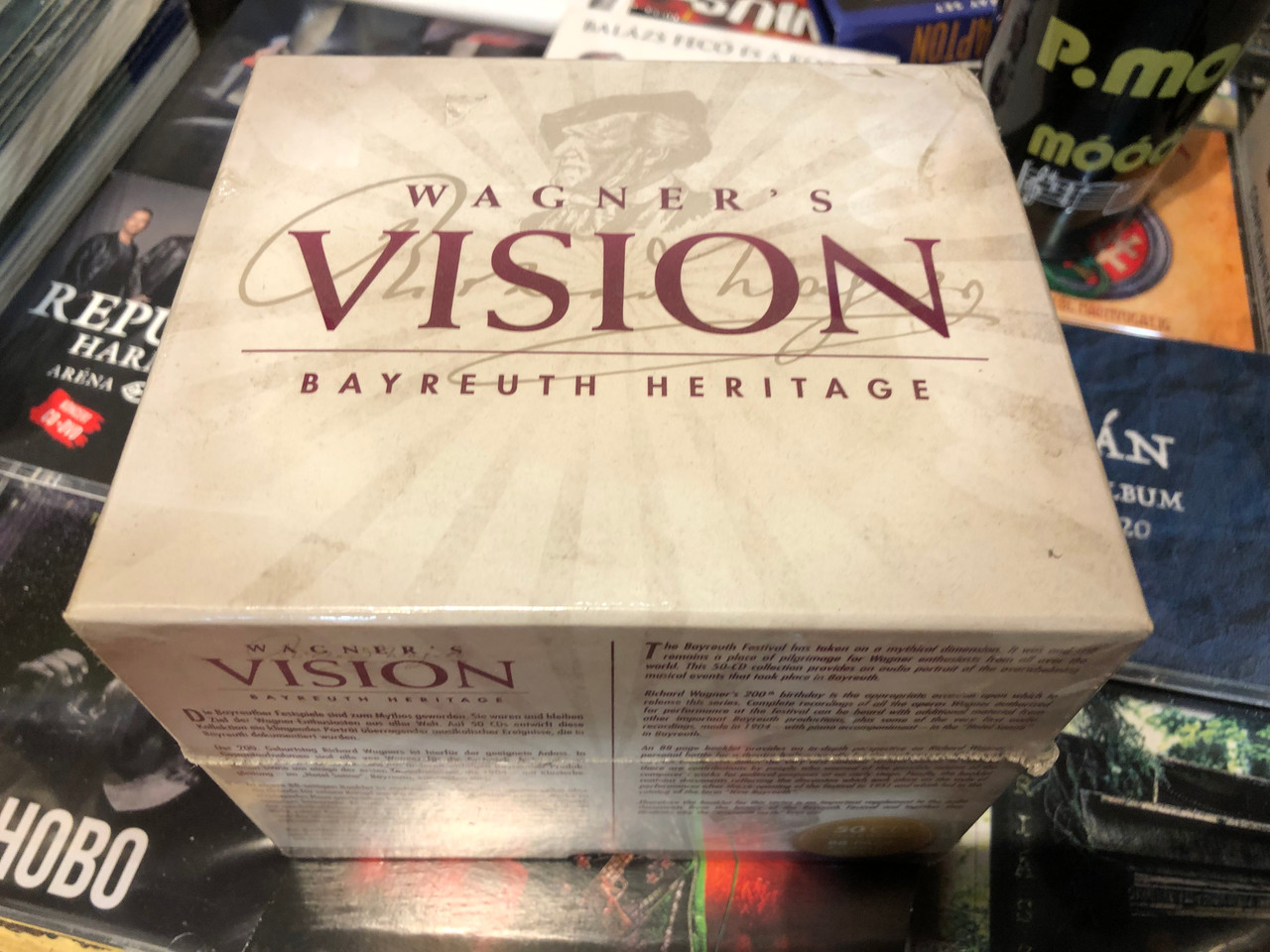 https://cdn10.bigcommerce.com/s-62bdpkt7pb/products/0/images/278972/Wagners_Vision_Bayreuth_Heritage_Document_Records_50x_Audio_CD_Box_Set_233618_1__04478.1687748976.1280.1280.JPG?c=2&_gl=1*1k35uf9*_ga*MjA2NTIxMjE2MC4xNTkwNTEyNTMy*_ga_WS2VZYPC6G*MTY4Nzc0ODc4My45NjIuMS4xNjg3NzQ5MDY0LjYwLjAuMA..