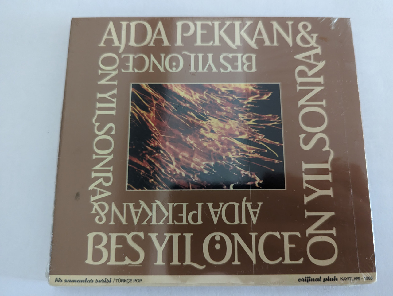 https://cdn10.bigcommerce.com/s-62bdpkt7pb/products/0/images/279404/Ajda_Pekkan_Be_Yl_nce_On_Yl_Sonra_Ossi_Mzik_Audio_CD_2010_Ossi-070_1__20301.1687857691.1280.1280.jpg?c=2&_gl=1*dkp7g0*_ga*MjA2NTIxMjE2MC4xNTkwNTEyNTMy*_ga_WS2VZYPC6G*MTY4Nzg0NjM3Ni45NjYuMS4xNjg3ODU3NTc2LjYwLjAuMA..