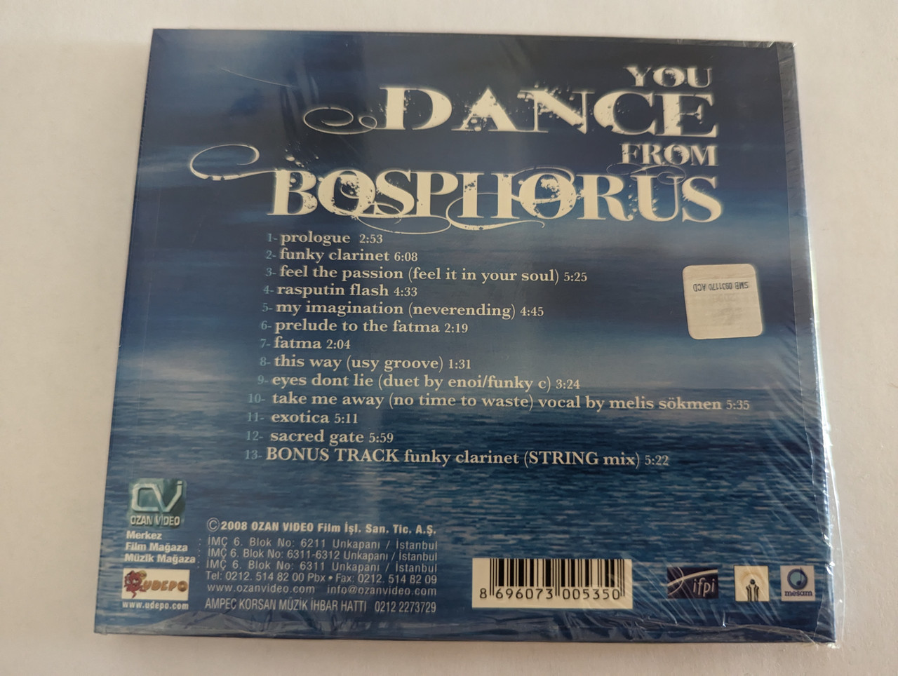 https://cdn10.bigcommerce.com/s-62bdpkt7pb/products/0/images/279420/You_Dance_From_Bosphorus_My_Imagination_Huseyin_Karadayi_Melis_Sokmen_Featuring_Kirpi_Funky_C_Ozan_Video_Film_Audio_CD_2008_0212_2273729_2__61023.1687859873.1280.1280.jpg?c=2&_gl=1*cn5469*_ga*MjA2NTIxMjE2MC4xNTkwNTEyNTMy*_ga_WS2VZYPC6G*MTY4Nzg0NjM3Ni45NjYuMS4xNjg3ODU5OTQ0LjYwLjAuMA..