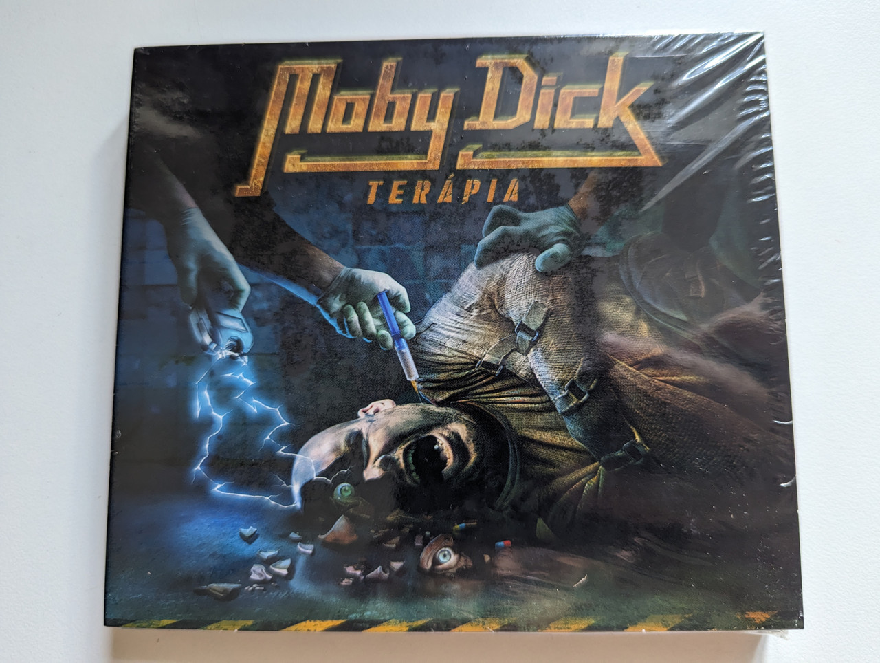 https://cdn10.bigcommerce.com/s-62bdpkt7pb/products/0/images/282694/Moby_Dick_Terpia_Hammer_Records_Audio_CD_2019_HMRCDVD_191_1__44062.1689050601.1280.1280.jpg?c=2&_gl=1*1nl8u8o*_ga*MjA2NTIxMjE2MC4xNTkwNTEyNTMy*_ga_WS2VZYPC6G*MTY4OTA0OTcyMi45ODIuMS4xNjg5MDUwNTAxLjUzLjAuMA..