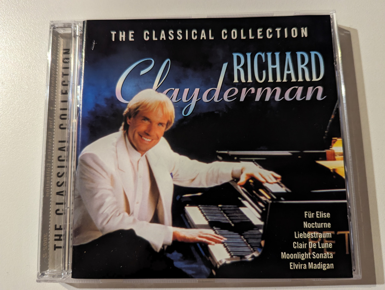 https://cdn10.bigcommerce.com/s-62bdpkt7pb/products/0/images/282741/Richard_Clayderman_The_Classical_Collection_-_Fr_Elise_Nocturne_Liebestraum_Clair_De_Lune_Moonlight_Sonata_Elvira_Madigan_CMC_Music_Audio_CD_1995_3002-2_1__07258.1689058126.1280.1280.jpg?c=2&_gl=1*sfr4l5*_ga*MjA2NTIxMjE2MC4xNTkwNTEyNTMy*_ga_WS2VZYPC6G*MTY4OTA0OTcyMi45ODIuMS4xNjg5MDU4MjIzLjYwLjAuMA..