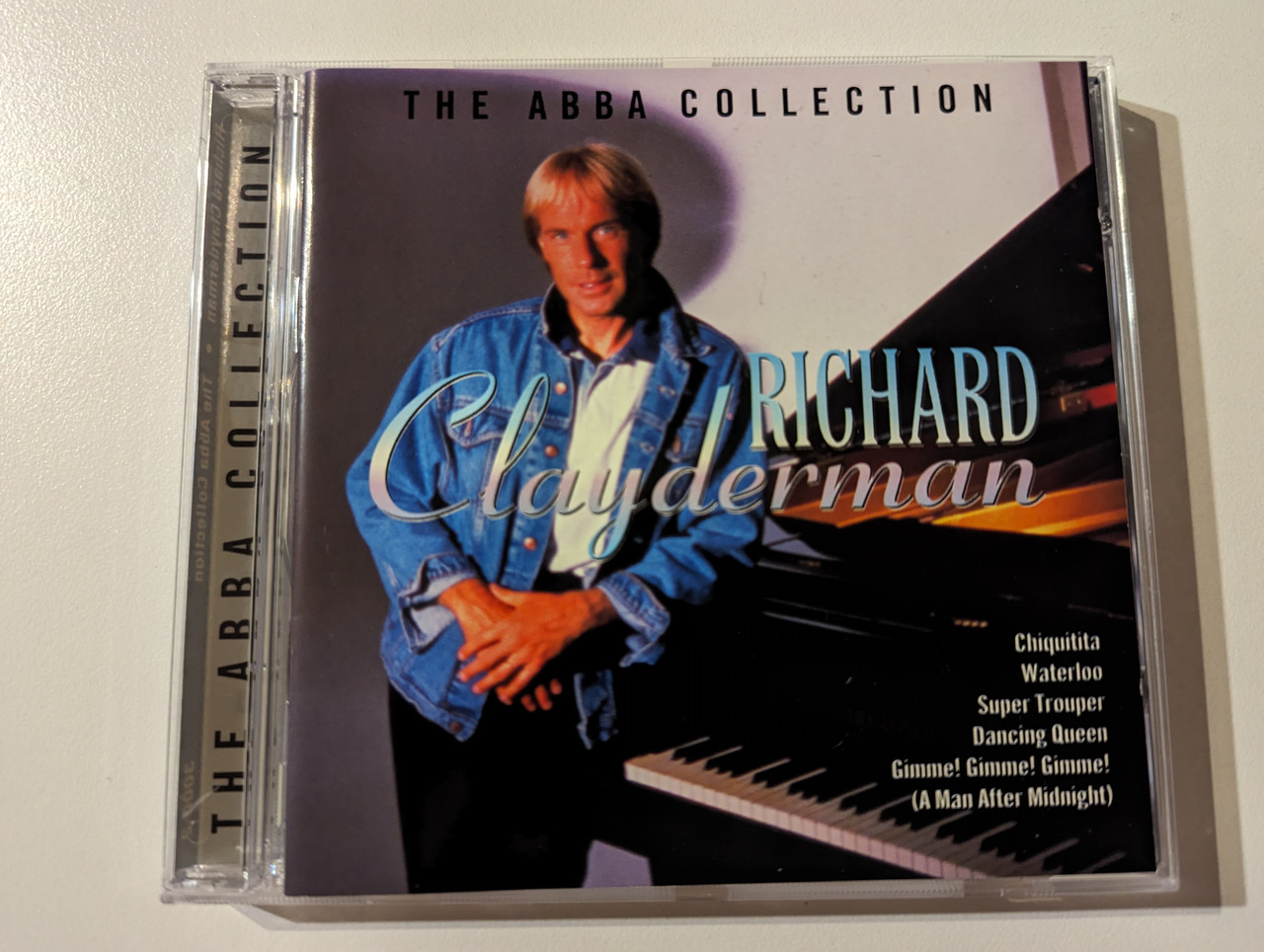 https://cdn10.bigcommerce.com/s-62bdpkt7pb/products/0/images/282749/Richard_Clayderman_The_ABBA_Collection_-_Chiquitita_Waterloo_Super_Trouper_Dancing_Queen_Gimme_Gimme_Gimme_A_Man_After_Midnight_CMC_Music_AS_Audio_CD_1996_3000-2_1__45237.1689058684.1280.1280.jpg?c=2&_gl=1*195wap0*_ga*MjA2NTIxMjE2MC4xNTkwNTEyNTMy*_ga_WS2VZYPC6G*MTY4OTA0OTcyMi45ODIuMS4xNjg5MDU4NDYxLjIyLjAuMA..