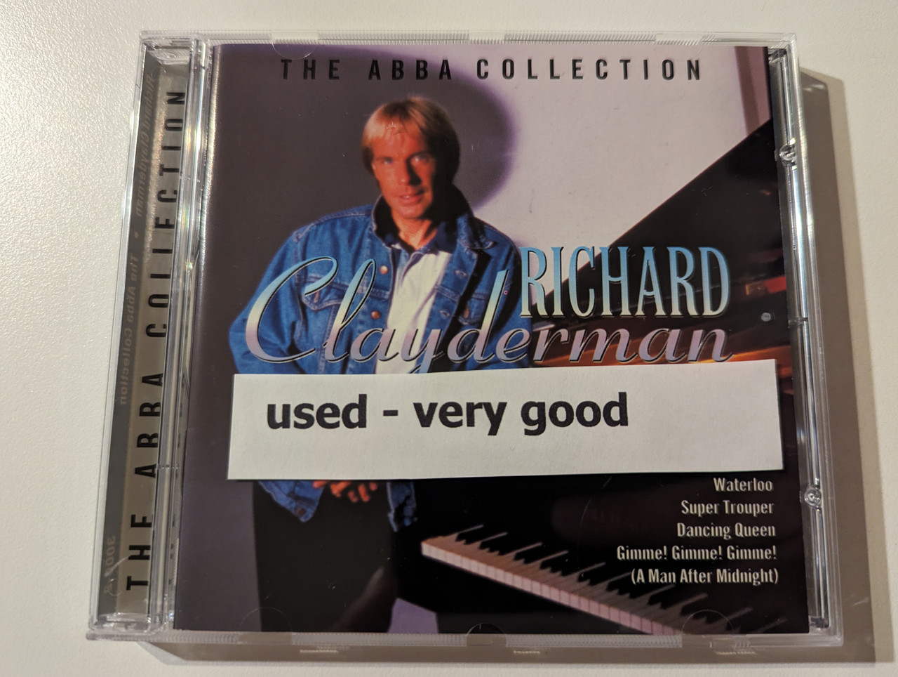 https://cdn10.bigcommerce.com/s-62bdpkt7pb/products/0/images/282758/Richard_Clayderman_The_ABBA_Collection_-_Chiquitita_Waterloo_Super_Trouper_Dancing_Queen_Gimme_Gimme_Gimme_A_Man_After_Midnight_CMC_Music_AS_Audio_CD_1996_3000-2_9__91711.1689058773.1280.1280.jpg?c=2&_gl=1*195wap0*_ga*MjA2NTIxMjE2MC4xNTkwNTEyNTMy*_ga_WS2VZYPC6G*MTY4OTA0OTcyMi45ODIuMS4xNjg5MDU4NDYxLjIyLjAuMA..