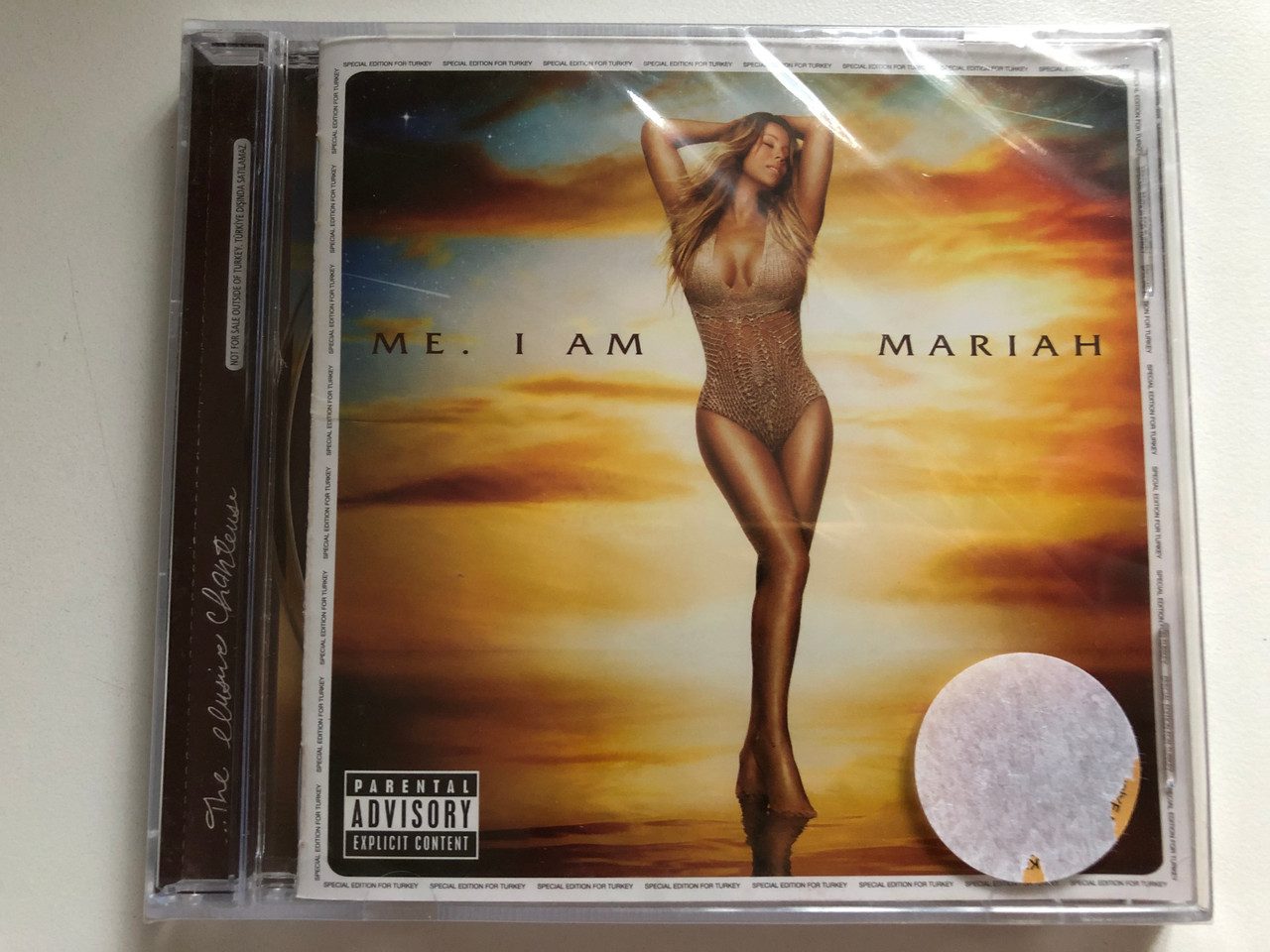 https://cdn10.bigcommerce.com/s-62bdpkt7pb/products/0/images/283318/Me._I_Am_Mariah_The_Elusive_Chanteuse_Def_Jam_Audio_CD_2014_378271-5_1__58554.1689257290.1280.1280.JPG?c=2&_gl=1*7zw83z*_ga*MjA2NTIxMjE2MC4xNTkwNTEyNTMy*_ga_WS2VZYPC6G*MTY4OTI1NzE1Ny45ODQuMS4xNjg5MjU3MzAwLjYwLjAuMA..