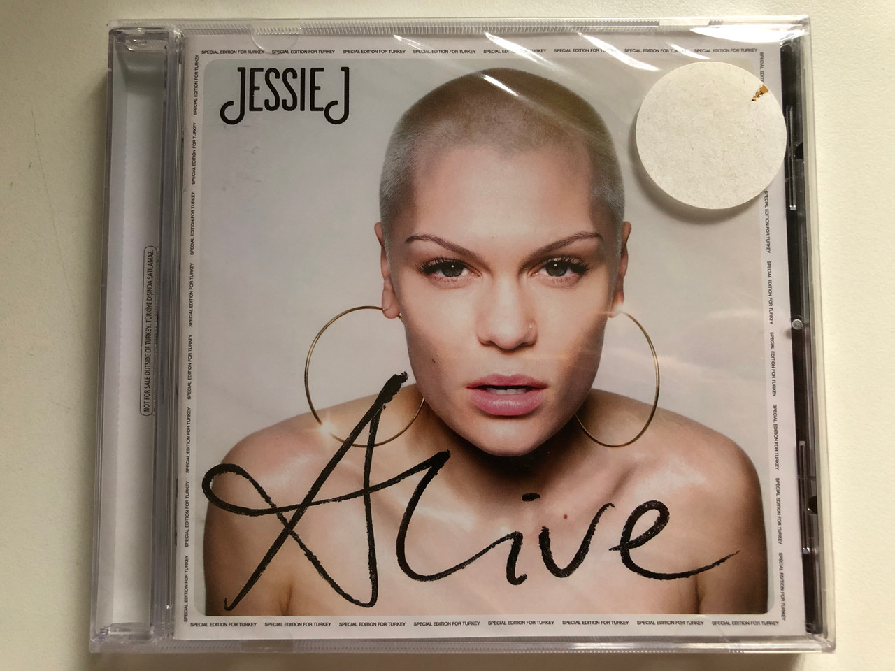 https://cdn10.bigcommerce.com/s-62bdpkt7pb/products/0/images/283321/Jessie_J_Alive_Lava_Audio_CD_2013_0602537555857_1__32201.1689257530.1280.1280.JPG?c=2&_gl=1*u1iira*_ga*MjA2NTIxMjE2MC4xNTkwNTEyNTMy*_ga_WS2VZYPC6G*MTY4OTI1NzE1Ny45ODQuMS4xNjg5MjU3NDIzLjEzLjAuMA..