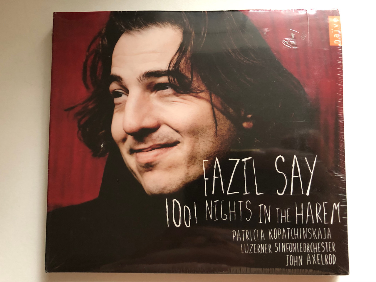 https://cdn10.bigcommerce.com/s-62bdpkt7pb/products/0/images/283549/Fazl_Say_1001_Nights_In_The_HaremPatricia_Kopatchinskaja_Luzerner_Sinfonieorchester_John_Axelrod_Nave_Audio_CD_2008_V5147-AK_1__57084.1689324849.1280.1280.JPG?c=2&_gl=1*1frv6vu*_ga*MjA2NTIxMjE2MC4xNTkwNTEyNTMy*_ga_WS2VZYPC6G*MTY4OTMxNTc2OS45ODUuMS4xNjg5MzI0NjIwLjQyLjAuMA..