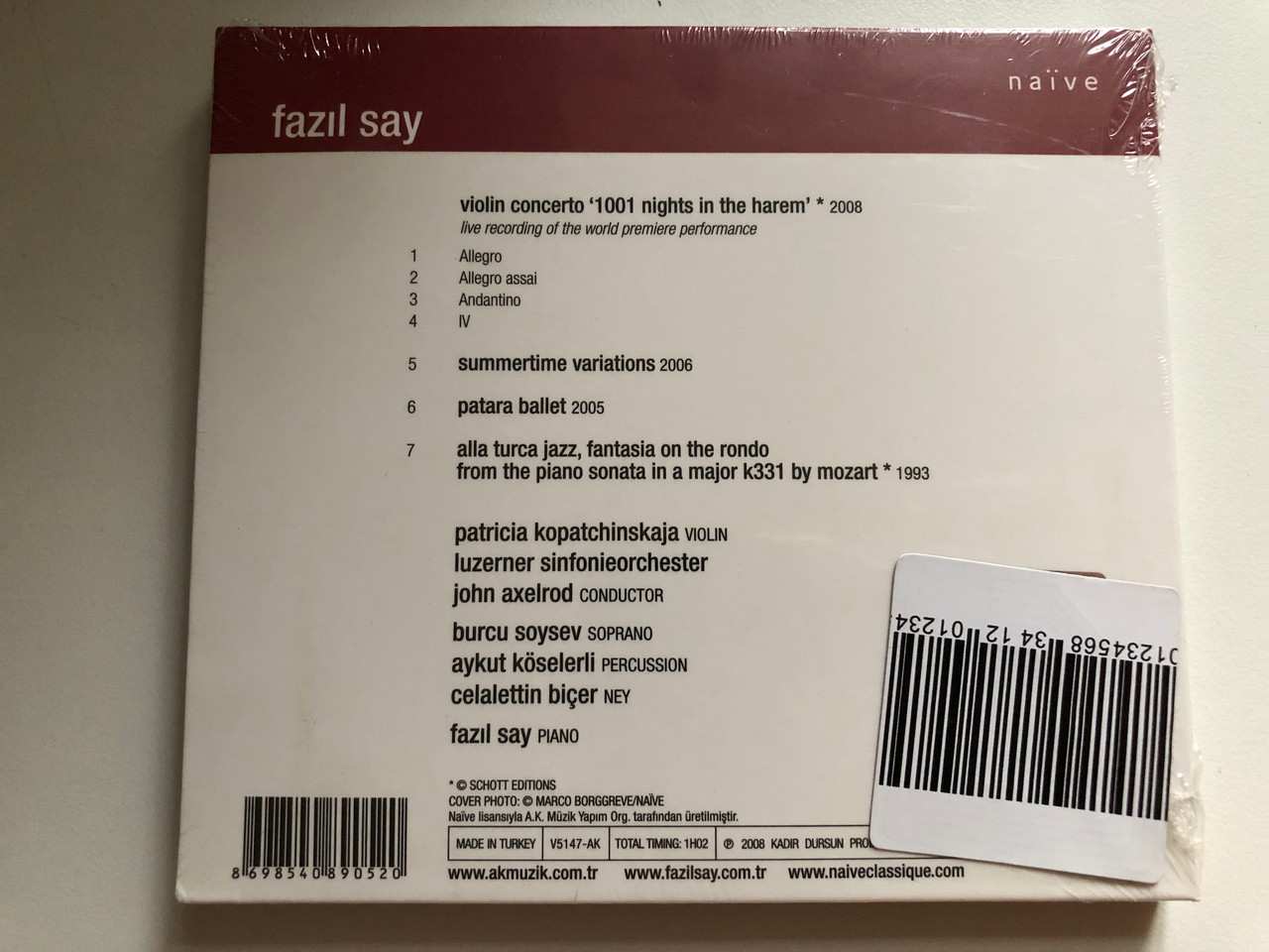 https://cdn10.bigcommerce.com/s-62bdpkt7pb/products/0/images/283550/Fazl_Say_1001_Nights_In_The_HaremPatricia_Kopatchinskaja_Luzerner_Sinfonieorchester_John_Axelrod_Nave_Audio_CD_2008_V5147-AK_2__56474.1689324852.1280.1280.JPG?c=2&_gl=1*1frv6vu*_ga*MjA2NTIxMjE2MC4xNTkwNTEyNTMy*_ga_WS2VZYPC6G*MTY4OTMxNTc2OS45ODUuMS4xNjg5MzI0NjIwLjQyLjAuMA..