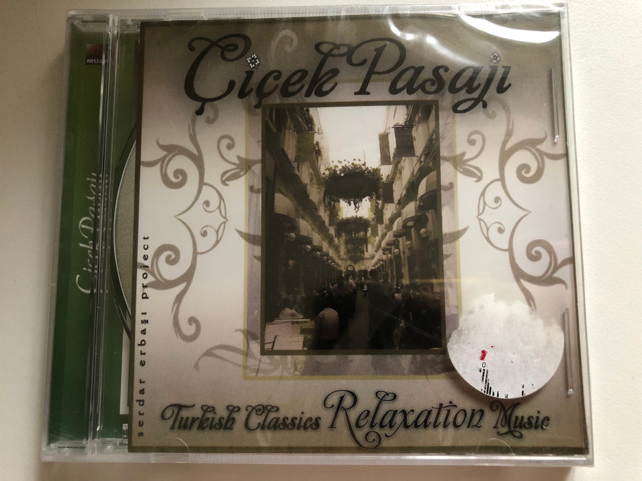 https://cdn10.bigcommerce.com/s-62bdpkt7pb/products/0/images/284555/iek_Pasaj_Turkish_Classiscs_Relaxation_Music_Ate_Mzik_Audio_CD_2010_1__50673.1689594506.1280.1280.JPG?c=2&_gl=1*dktbrq*_ga*MjA2NTIxMjE2MC4xNTkwNTEyNTMy*_ga_WS2VZYPC6G*MTY4OTU5Mzg0OC45ODcuMS4xNjg5NTk0NDc4LjYwLjAuMA..
