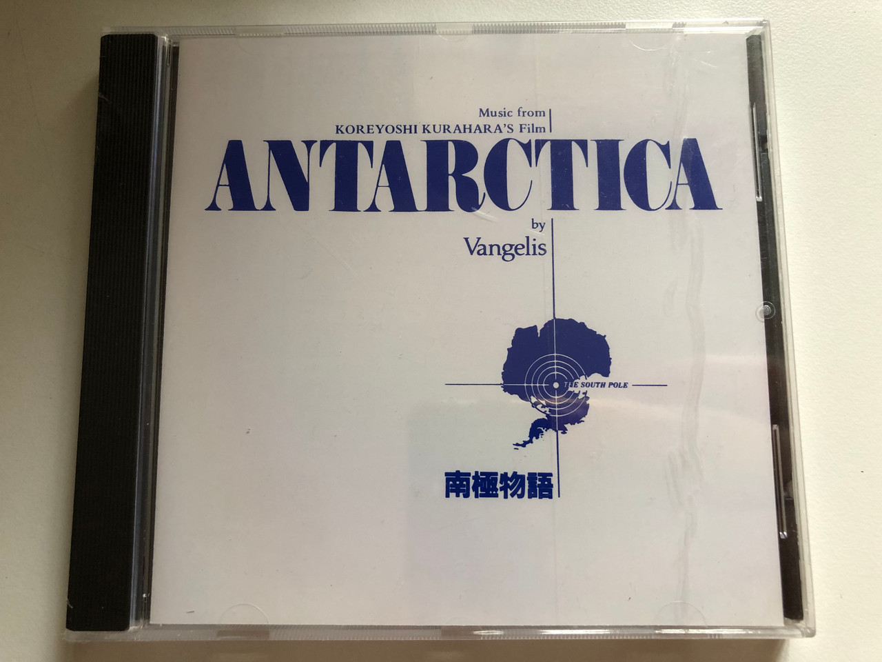 https://cdn10.bigcommerce.com/s-62bdpkt7pb/products/0/images/284562/Antarctica_Music_From_Koreyoshi_Kuraharas_Film_by_Vangelis_Polydor_Audio_CD_1988_815_732-2_1__46557.1689596218.1280.1280.JPG?c=2&_gl=1*vabcua*_ga*MjA2NTIxMjE2MC4xNTkwNTEyNTMy*_ga_WS2VZYPC6G*MTY4OTU5Mzg0OC45ODcuMS4xNjg5NTk1NzEyLjI5LjAuMA..