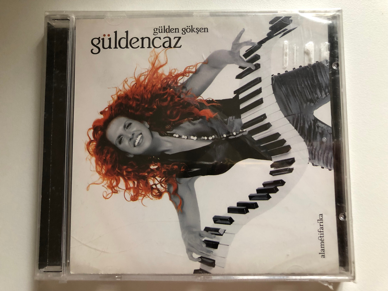 https://cdn10.bigcommerce.com/s-62bdpkt7pb/products/0/images/284575/Glden_Gken_Gldencaz_Doan_Music_Company_Audio_CD_DMC-20189_1__70350.1689598574.1280.1280.JPG?c=2&_gl=1*w5m53k*_ga*MjA2NTIxMjE2MC4xNTkwNTEyNTMy*_ga_WS2VZYPC6G*MTY4OTU5Mzg0OC45ODcuMS4xNjg5NTk4NTYyLjYwLjAuMA..