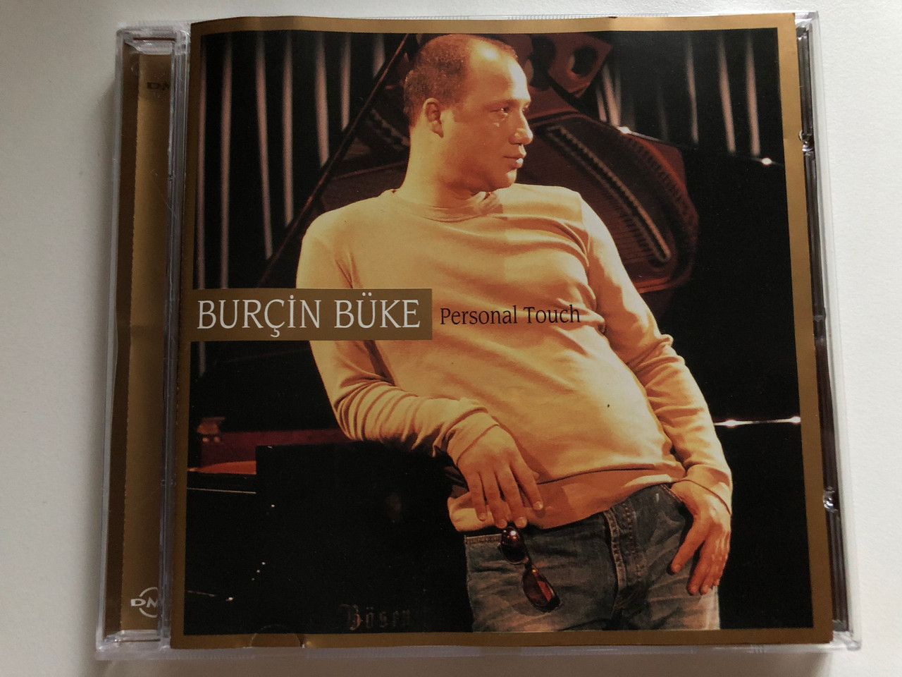 https://cdn10.bigcommerce.com/s-62bdpkt7pb/products/0/images/284770/Burin_Bke_Personal_Touch_DMC_Audio_CD_DMC-20107_1__82030.1689620974.1280.1280.JPG?c=2&_gl=1*dhmov0*_ga*MjA2NTIxMjE2MC4xNTkwNTEyNTMy*_ga_WS2VZYPC6G*MTY4OTYyMDUyOS45ODguMS4xNjg5NjIwOTA5LjYwLjAuMA..