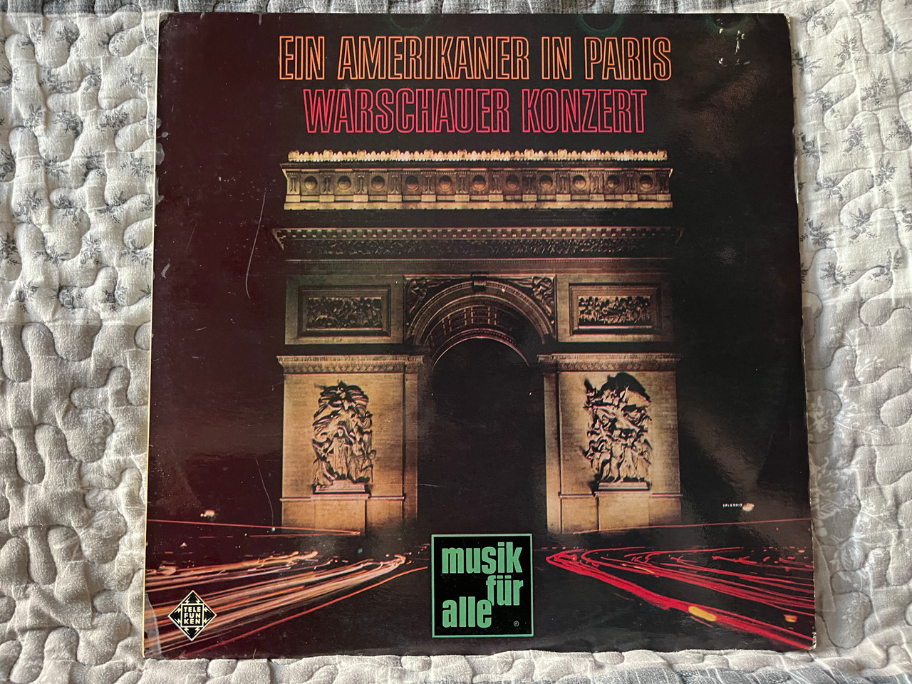 https://cdn10.bigcommerce.com/s-62bdpkt7pb/products/0/images/285854/Ein_Amerikaner_In_Paris_Warschauer_Konzert_Musik_Fr_Alle_Telefunken_LP_Stereo_NT_463_1__49297.1689793413.1280.1280.jpg?c=2&_gl=1*sa229k*_ga*MjA2NTIxMjE2MC4xNTkwNTEyNTMy*_ga_WS2VZYPC6G*MTY4OTc3Mzc2Ny45ODkuMS4xNjg5NzkzMzgxLjYwLjAuMA..