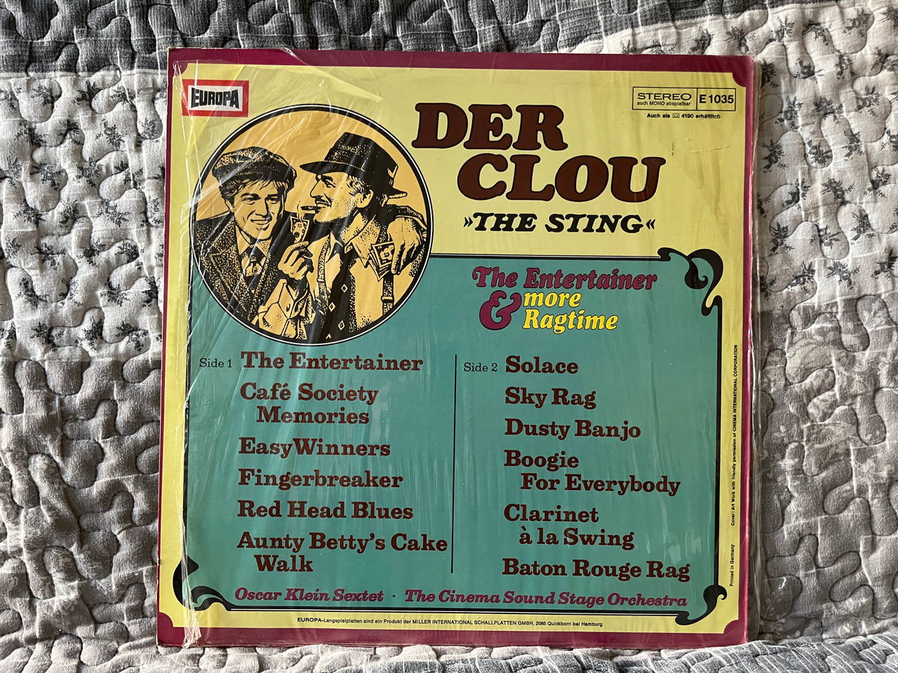 https://cdn10.bigcommerce.com/s-62bdpkt7pb/products/0/images/286340/Der_Clou_The_String_-_The_Entertainer_More_Ragtime_Europa_LP_Stereo_E_1035_2__17664.1689865530.1280.1280.jpg?c=2&_gl=1*1eenfev*_ga*MjA2NTIxMjE2MC4xNTkwNTEyNTMy*_ga_WS2VZYPC6G*MTY4OTg1NzM1NS45OTAuMS4xNjg5ODY1MzUwLjU5LjAuMA..