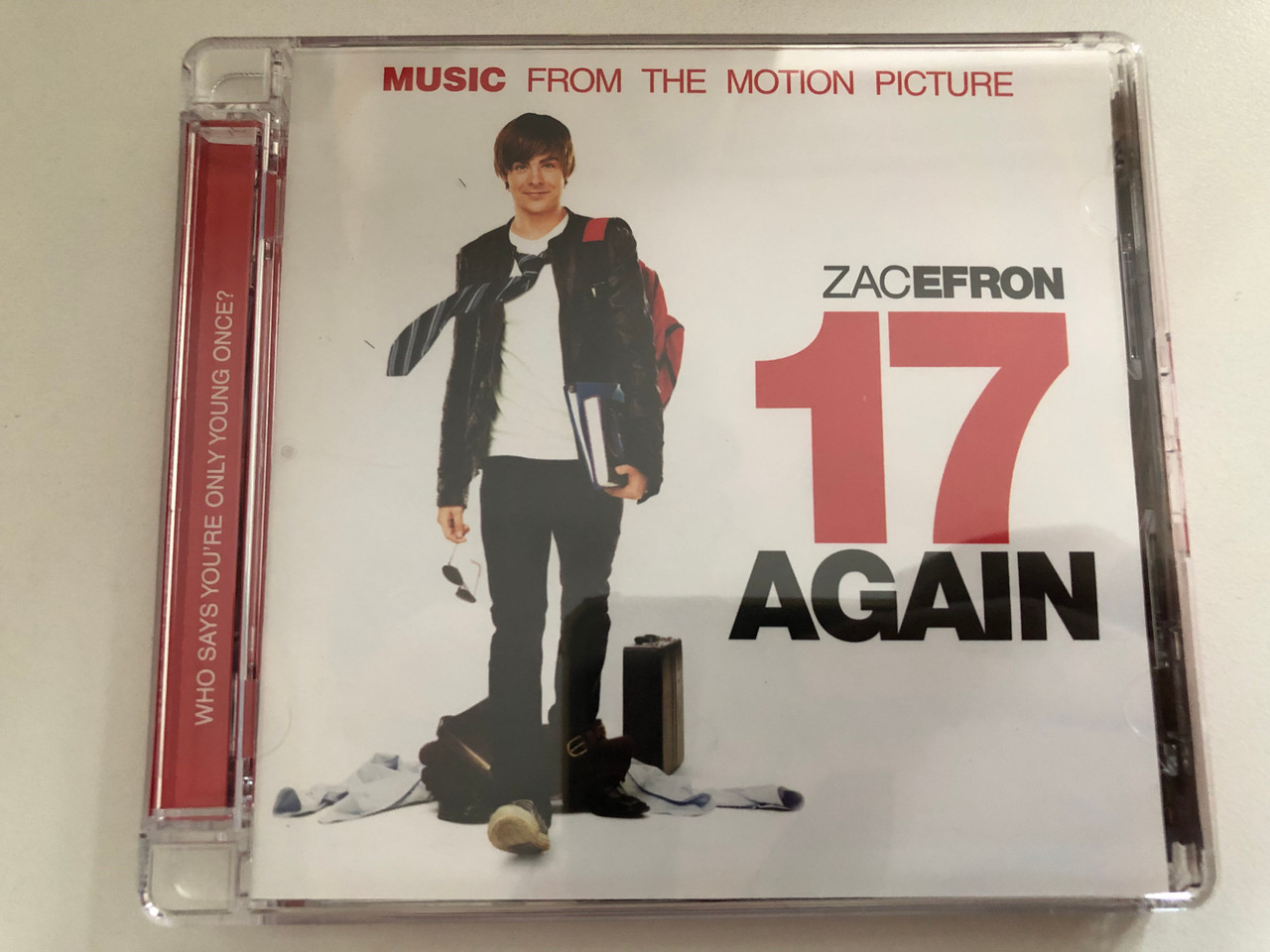 https://cdn10.bigcommerce.com/s-62bdpkt7pb/products/0/images/287207/Zac_Efron_17_Again_Music_From_The_Motion_Picture_Decca_Audio_CD_2009_478_1833_1__47753.1690187058.1280.1280.JPG?c=2&_gl=1*18egu9p*_ga*MjA2NTIxMjE2MC4xNTkwNTEyNTMy*_ga_WS2VZYPC6G*MTY5MDE3ODQ1Ni45OTMuMS4xNjkwMTg2ODczLjU4LjAuMA..