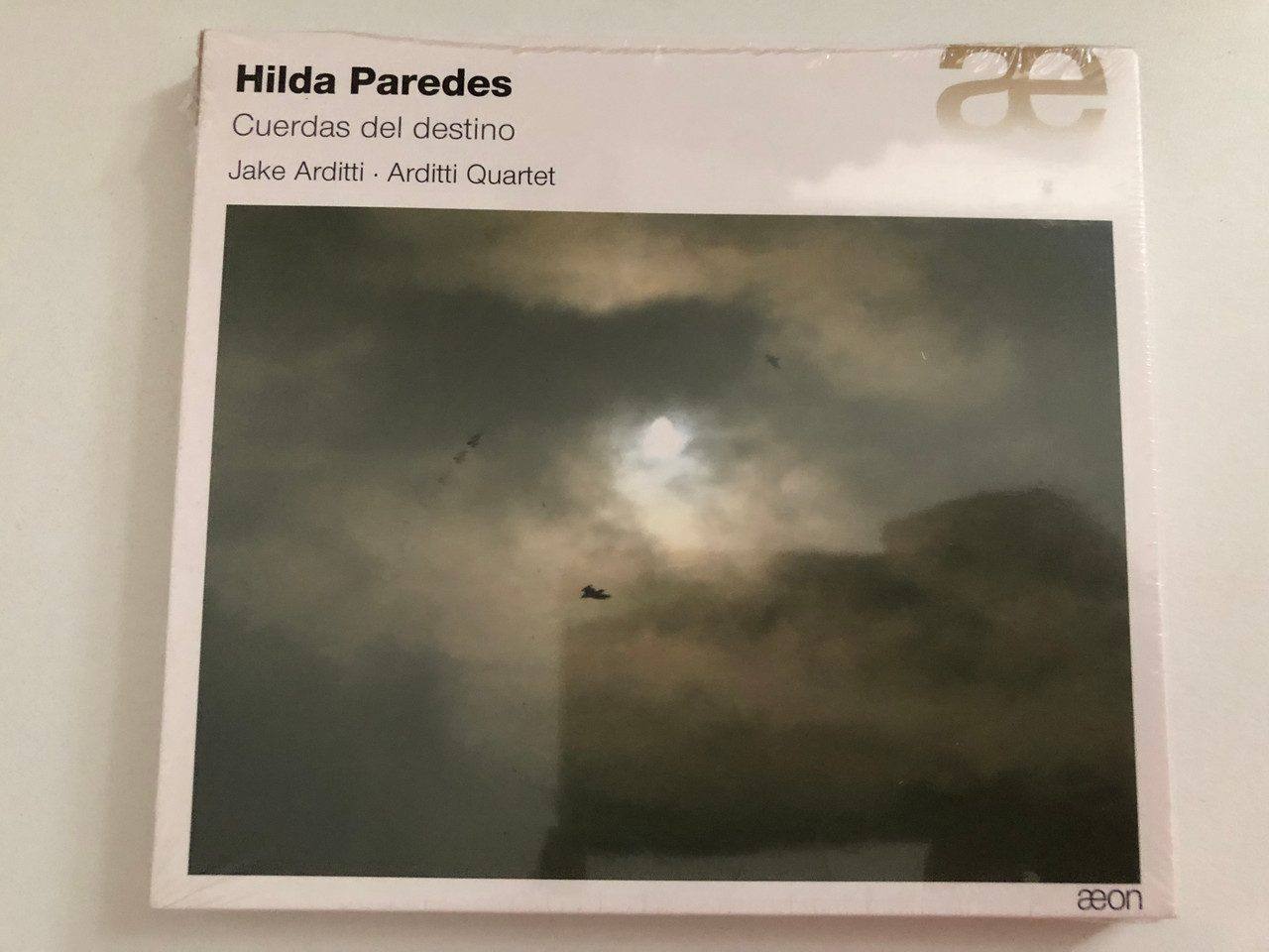 https://cdn10.bigcommerce.com/s-62bdpkt7pb/products/0/images/287379/Hilda_Paredes_Cuerdas_Del_Destino_-_Jake_Arditti_Arditti_Quartet_on_Audio_CD_2014_AECD_1439_1__09268.1690270658.1280.1280.JPG?c=2&_gl=1*1oaxgq1*_ga*MjA2NTIxMjE2MC4xNTkwNTEyNTMy*_ga_WS2VZYPC6G*MTY5MDI2NTMxNy45OTUuMS4xNjkwMjcwNTc3LjQ4LjAuMA..