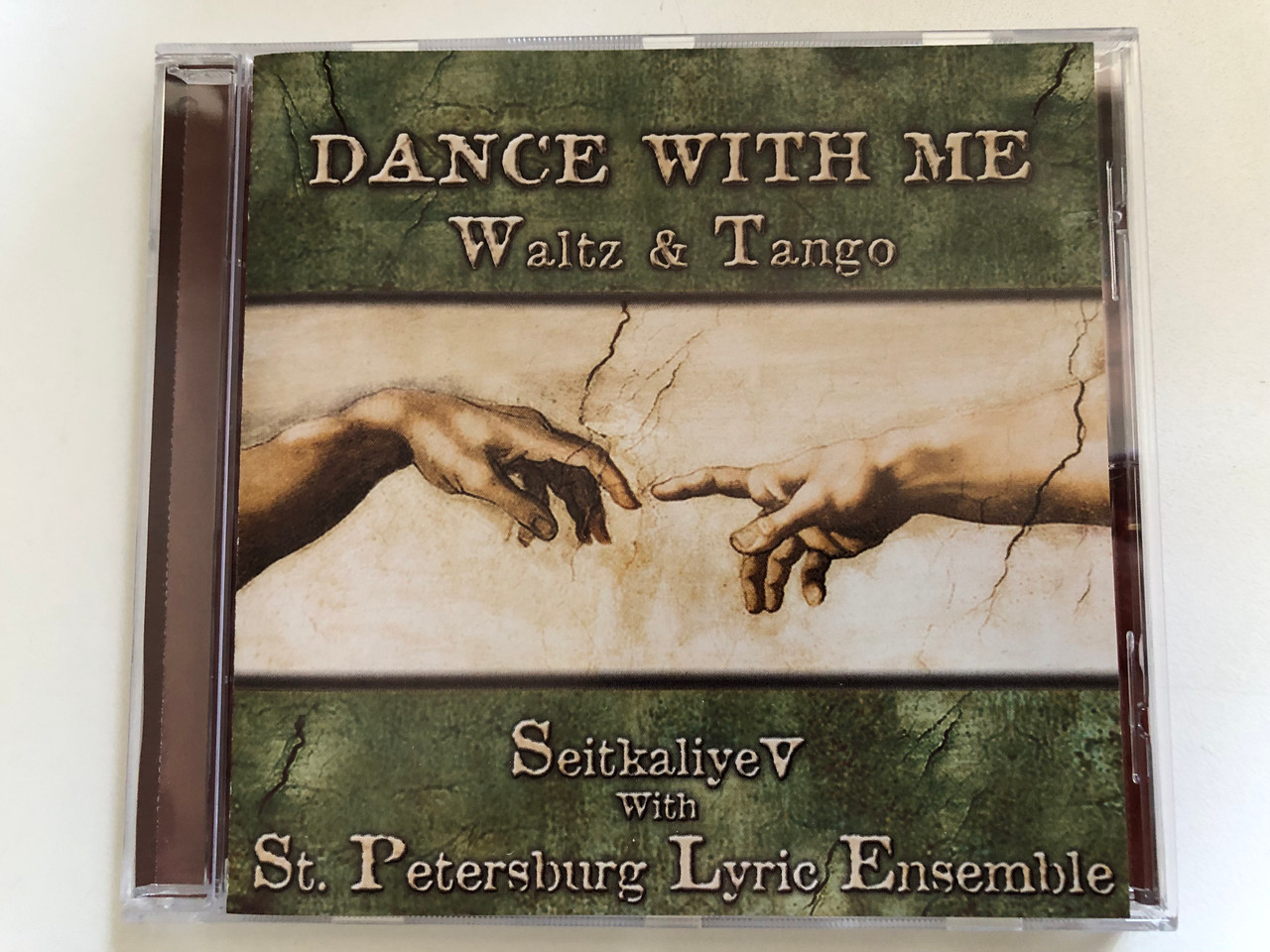 https://cdn10.bigcommerce.com/s-62bdpkt7pb/products/0/images/287402/Dance_With_Me_Waltz_Tango_-_Seitkaliyev_With_St._Petersburg_Lyric_Ensamble_Handiser_Co._Audio_CD_2003_8697406642006_1__03724.1690275050.1280.1280.JPG?c=2&_gl=1*w4oxm0*_ga*MjA2NTIxMjE2MC4xNTkwNTEyNTMy*_ga_WS2VZYPC6G*MTY5MDI2NTMxNy45OTUuMS4xNjkwMjc1MTc4LjYwLjAuMA..
