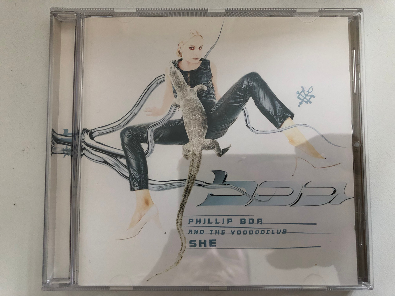 https://cdn10.bigcommerce.com/s-62bdpkt7pb/products/0/images/288019/Phillip_Boa_And_The_Voodooclub_She_Motor_Music_Audio_CD_1996_529_753-2_1__10562.1690524945.1280.1280.JPG?c=2&_gl=1*15kqd2q*_ga*MjA2NTIxMjE2MC4xNTkwNTEyNTMy*_ga_WS2VZYPC6G*MTY5MDUxODExMC4xMDAwLjEuMTY5MDUyNDUxMy40NC4wLjA.