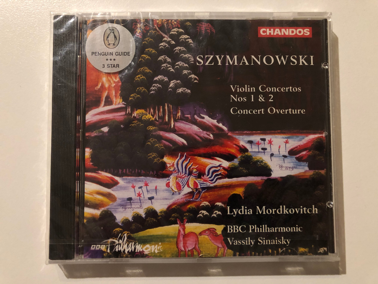 https://cdn10.bigcommerce.com/s-62bdpkt7pb/products/0/images/289146/Szymanowski_-_Violin_Concertos_Nos_1_2_Concert_Overture_-_Lydia_Mordkovitch_BBC_Philharmonic_Vassily_Sinaisky_Chandos_Audio_CD_1996_CHAN_9496_1__94241.1690906928.1280.1280.JPG?c=2&_gl=1*1p5iw1g*_ga*MjA2NTIxMjE2MC4xNTkwNTEyNTMy*_ga_WS2VZYPC6G*MTY5MDg5NzA1My4xMDAzLjEuMTY5MDkwNzAxNC42MC4wLjA.