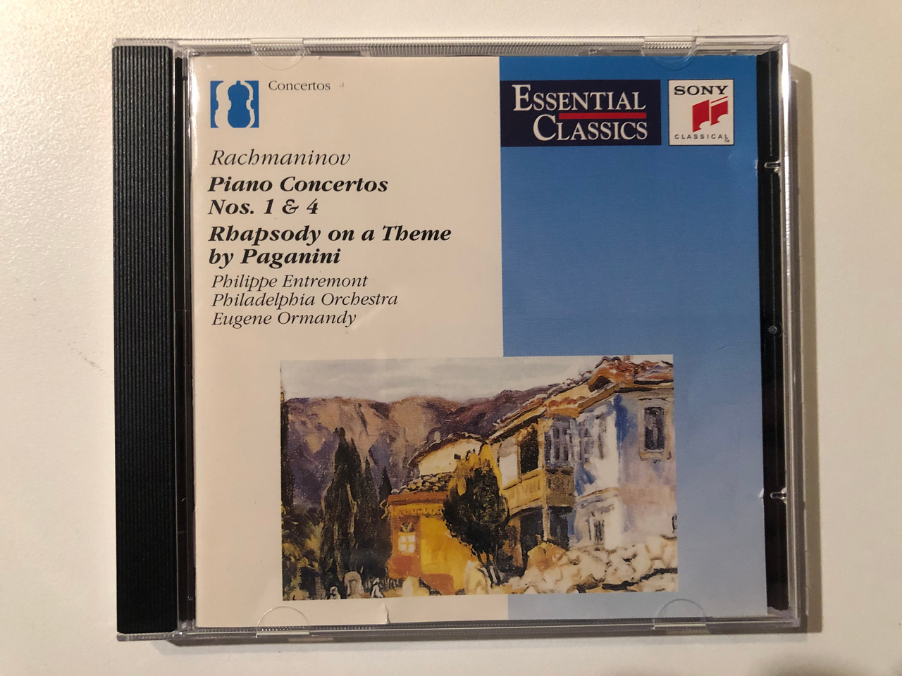https://cdn10.bigcommerce.com/s-62bdpkt7pb/products/0/images/289493/Rachmaninov_Piano_Concertos_Nos._1_4_Rhapsody_On_A_Theme_By_Paganini_-_-_Philippe_Entremont_Philadelphia_Orchestra_Eugene_Ormandy_Essential_Classics_Concertos_Sony_Classical_Audio_CD_1_1__70848.1690990897.1280.1280.JPG?c=2&_gl=1*1ybdr2g*_ga*MjA2NTIxMjE2MC4xNTkwNTEyNTMy*_ga_WS2VZYPC6G*MTY5MDk4NDE2OC4xMDA0LjEuMTY5MDk5MDg5Mi42MC4wLjA.
