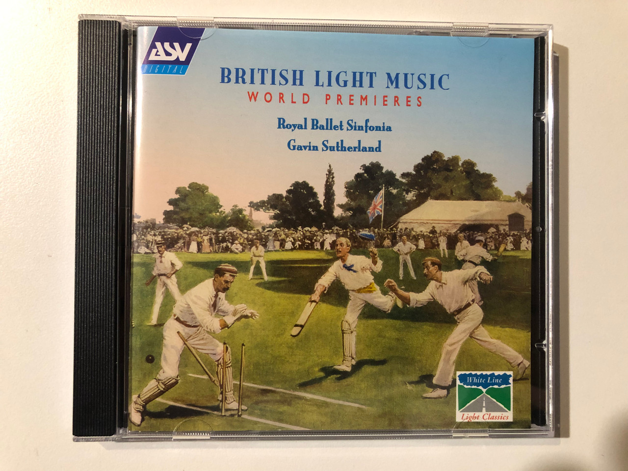 https://cdn10.bigcommerce.com/s-62bdpkt7pb/products/0/images/289710/British_Light_Music_World_Premieres_-_Royal_Ballet_Sinfonia_Gavin_Sutherland_White_Line_Light_Classics_ASV_Digital_Audio_CD_1999_CD_WHL_2116_1__16386.1691071487.1280.1280.JPG?c=2&_gl=1*1hwf8m9*_ga*MjA2NTIxMjE2MC4xNTkwNTEyNTMy*_ga_WS2VZYPC6G*MTY5MTA2ODU3My4xMDA1LjEuMTY5MTA3MTMyMi41OC4wLjA.