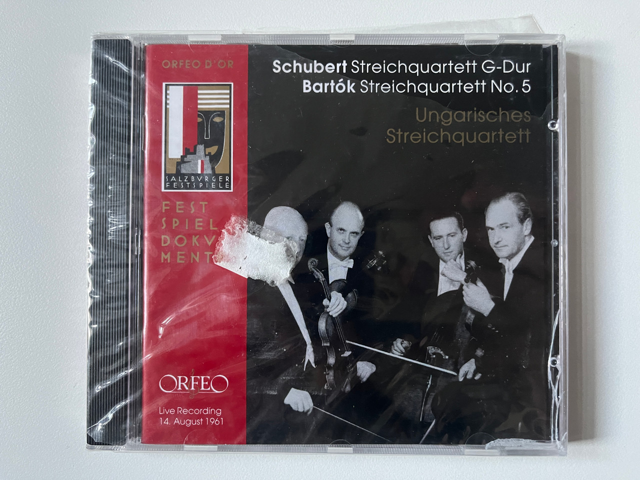https://cdn10.bigcommerce.com/s-62bdpkt7pb/products/0/images/290375/Schubert_Streichquartett_G-Dur_Bartok_Streichquartett_No._5_-_Ungarisches_Streichquartett_Live_Recording_14._August_1961_Orfeo_Audio_CD_Mono_C_604_031_B_1__07536.1691170127.1280.1280.jpg?c=2&_gl=1*1gluzar*_ga*MjA2NTIxMjE2MC4xNTkwNTEyNTMy*_ga_WS2VZYPC6G*MTY5MTE1Njg1My4xMDA2LjEuMTY5MTE2OTkyMC41OC4wLjA.