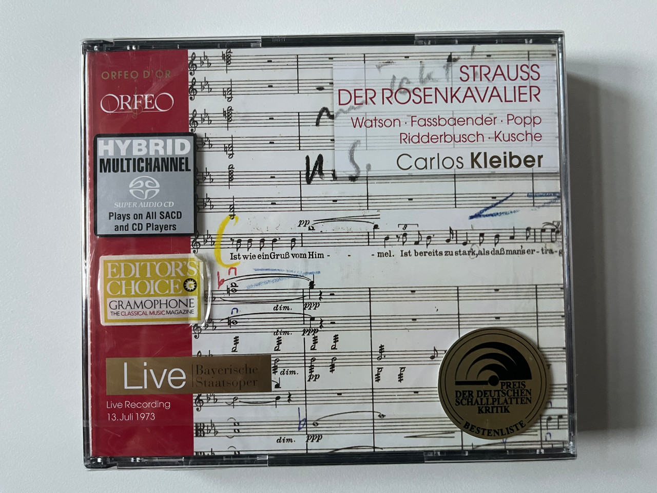 https://cdn10.bigcommerce.com/s-62bdpkt7pb/products/0/images/290395/Strauss_Der_Rosenkavalier_-_Watson_Fassbaender_Popp_Ridderbusch_Kusche_Carlos_Kleiber_Live_Recording_13._Juli_1973_Orfeo_3x_Audio_CD_Stereo_2008_C_581_083_D_1__64150.1691171327.1280.1280.jpg?c=2&_gl=1*s52yui*_ga*MjA2NTIxMjE2MC4xNTkwNTEyNTMy*_ga_WS2VZYPC6G*MTY5MTE1Njg1My4xMDA2LjEuMTY5MTE3MDk1My41MS4wLjA.