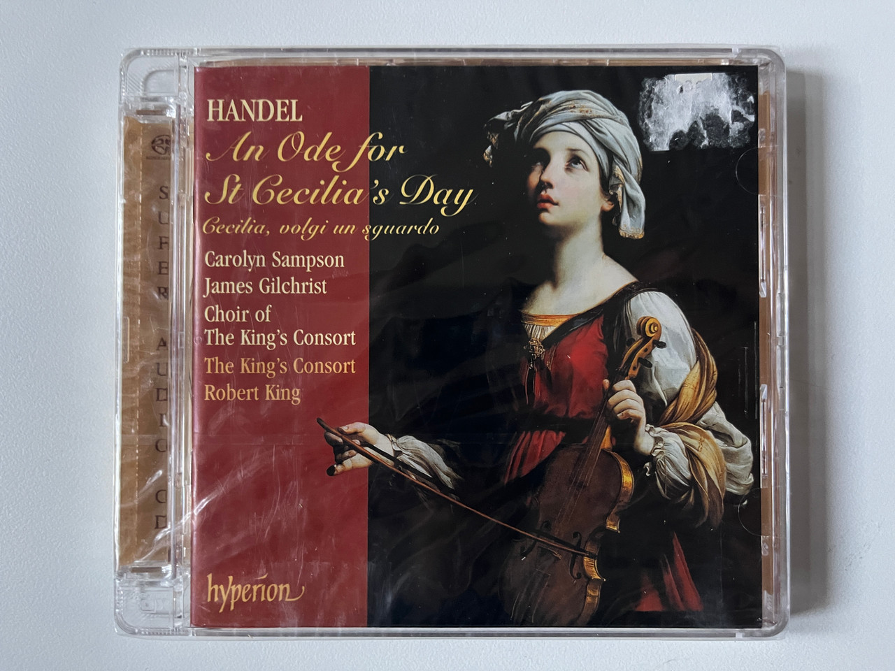 https://cdn10.bigcommerce.com/s-62bdpkt7pb/products/0/images/291977/Handel_-_An_Ode_For_St_Cecilias_Day_Cecilia_Volgi_Un_Sguardo_-_Carolyn_Sampson_James_Gilchrist_Choir_Of_The_Kings_Consort_The_Kings_Consort_Robert_King_Hyperion_Hybrid_Disc_SACDA674_1__17967.1691508279.1280.1280.jpg?c=2&_gl=1*1549eyb*_ga*MjA2NTIxMjE2MC4xNTkwNTEyNTMy*_ga_WS2VZYPC6G*MTY5MTUwNzU5NS4xMDExLjEuMTY5MTUwNzc0MS42MC4wLjA.