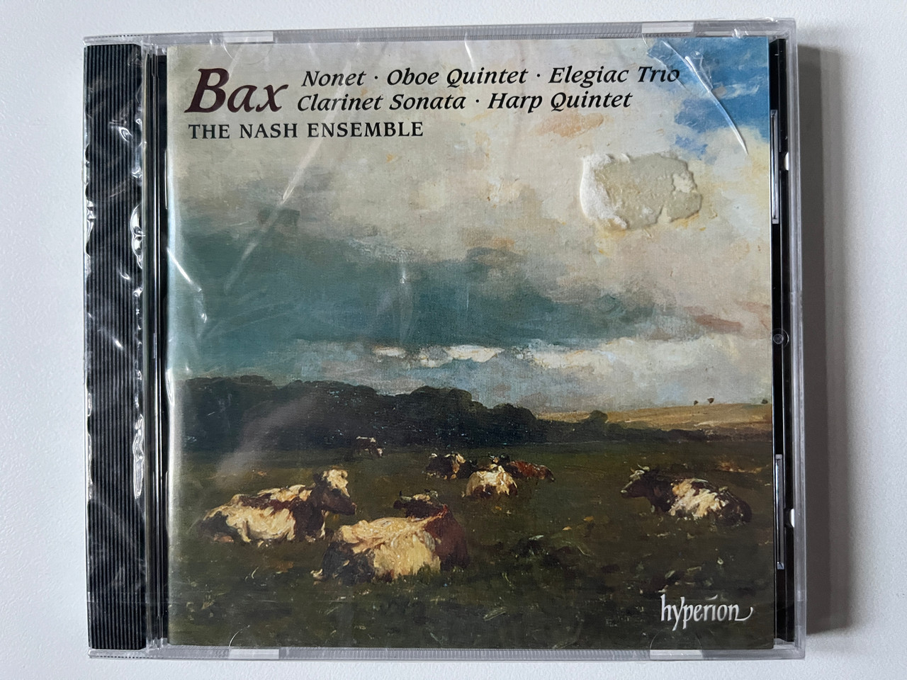 https://cdn10.bigcommerce.com/s-62bdpkt7pb/products/0/images/292056/Bax_The_Nash_Ensemble_Nonet_Oboe_Quintet_Elegiac_Trio_Clarinet_Sonata_Harp_Quintet_Hyperion_Audio_CD_CDA66807_1__26862.1691515847.1280.1280.jpg?c=2&_gl=1*vsd19q*_ga*MjA2NTIxMjE2MC4xNTkwNTEyNTMy*_ga_WS2VZYPC6G*MTY5MTUwNzU5NS4xMDExLjEuMTY5MTUxNTQ3NS41Ny4wLjA.