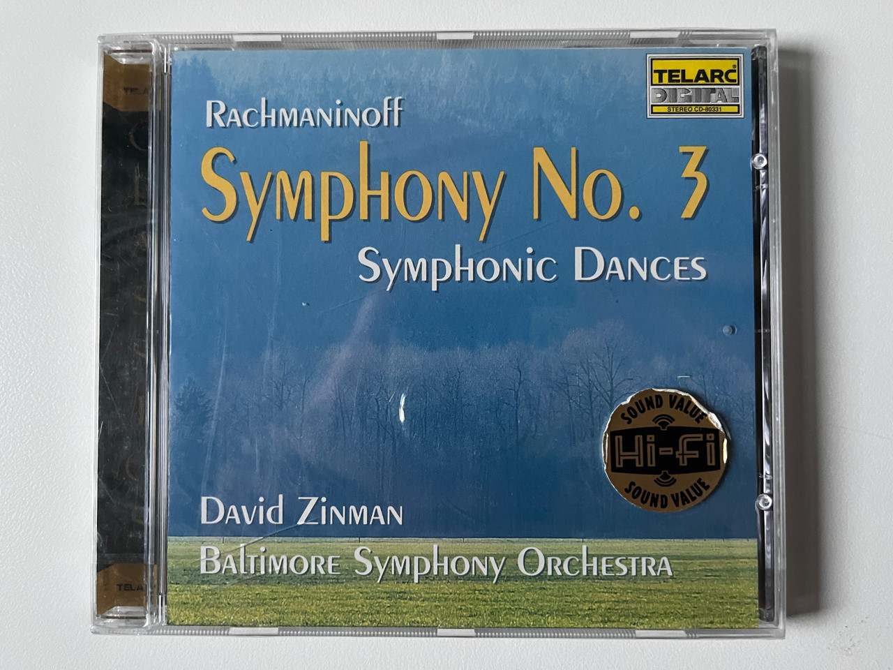 https://cdn10.bigcommerce.com/s-62bdpkt7pb/products/0/images/292132/Rachmaninoff_Symphony_No._3_Symphonic_Dances_-_David_Zinman_Baltimore_Symphony_Orchestra_Telarc_Audio_CD_1994_CD-80331_1__18892.1691566409.1280.1280.jpg?c=2&_gl=1*155e8n9*_ga*MjA2NTIxMjE2MC4xNTkwNTEyNTMy*_ga_WS2VZYPC6G*MTY5MTU2Mjc2OC4xMDEyLjEuMTY5MTU2NjM2My42MC4wLjA.