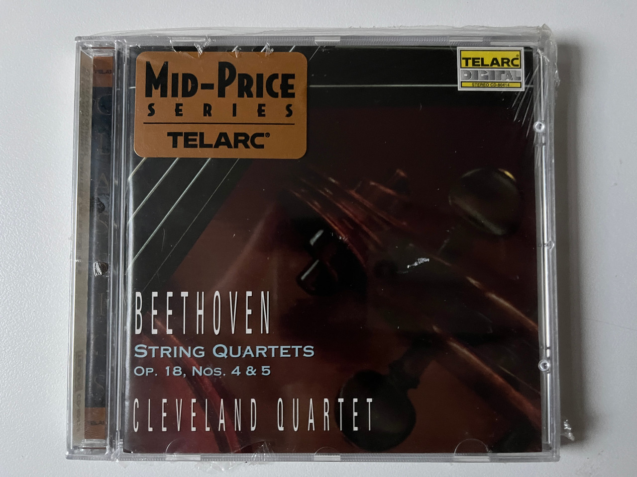 https://cdn10.bigcommerce.com/s-62bdpkt7pb/products/0/images/292142/Beethoven_String_Quartets_Op._18_Nos._4_5_-_The_Cleveland_Quartet_Telarc_Audio_CD_1995_CD-80414_1__25337.1691569917.1280.1280.jpg?c=2&_gl=1*f7nr1f*_ga*MjA2NTIxMjE2MC4xNTkwNTEyNTMy*_ga_WS2VZYPC6G*MTY5MTU2Mjc2OC4xMDEyLjEuMTY5MTU2Nzg1NC4yOS4wLjA.