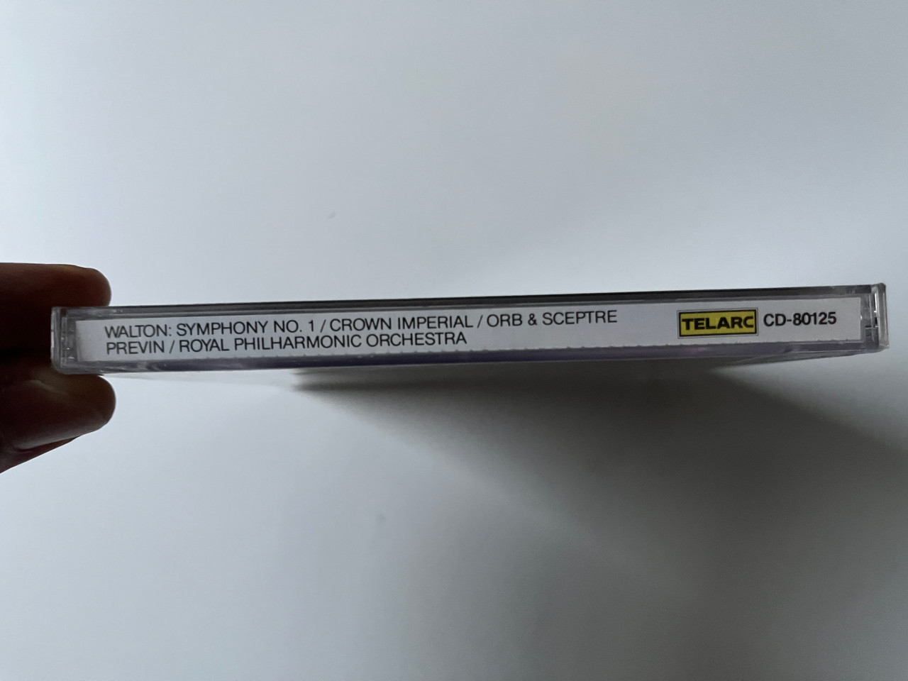 https://cdn10.bigcommerce.com/s-62bdpkt7pb/products/0/images/292147/Walton_-_Symphony_No._1_Orb_Sceptre_Crown_Imperial_-_Andr_Previn_The_Royal_Philharmonic_Orchestra_Telarc_Digital_Audio_CD_1987_CD-80125_3__72389.1691570190.1280.1280.jpg?c=2&_gl=1*1k04jdy*_ga*MjA2NTIxMjE2MC4xNTkwNTEyNTMy*_ga_WS2VZYPC6G*MTY5MTU3MDA2NS4xMDEzLjEuMTY5MTU3MDA4MS40NC4wLjA.