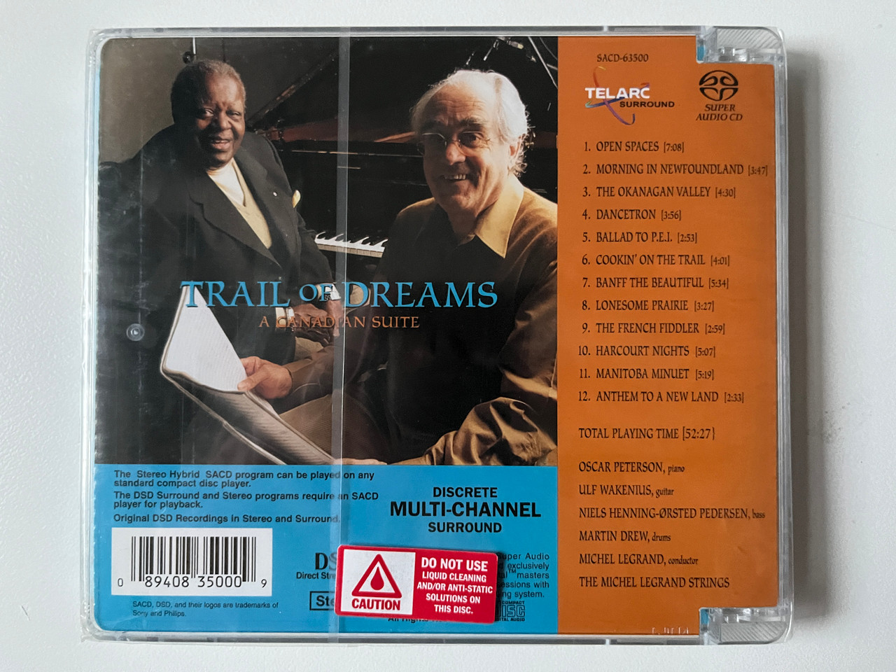 https://cdn10.bigcommerce.com/s-62bdpkt7pb/products/0/images/292152/Oscar_Peterson_Trail_Of_Dreams_-_A_Canadian_Suite_-_Michel_Legrand_Oscar_Peterson_Quartet_The_Michel_Legrand_Strings_Telarc_Hybrid_Disc_Stereo_SACD-63500_2__54875.1691571617.1280.1280.jpg?c=2&_gl=1*11z7ddk*_ga*MjA2NTIxMjE2MC4xNTkwNTEyNTMy*_ga_WS2VZYPC6G*MTY5MTU3MDA2NS4xMDEzLjEuMTY5MTU3MTU1OS42MC4wLjA.