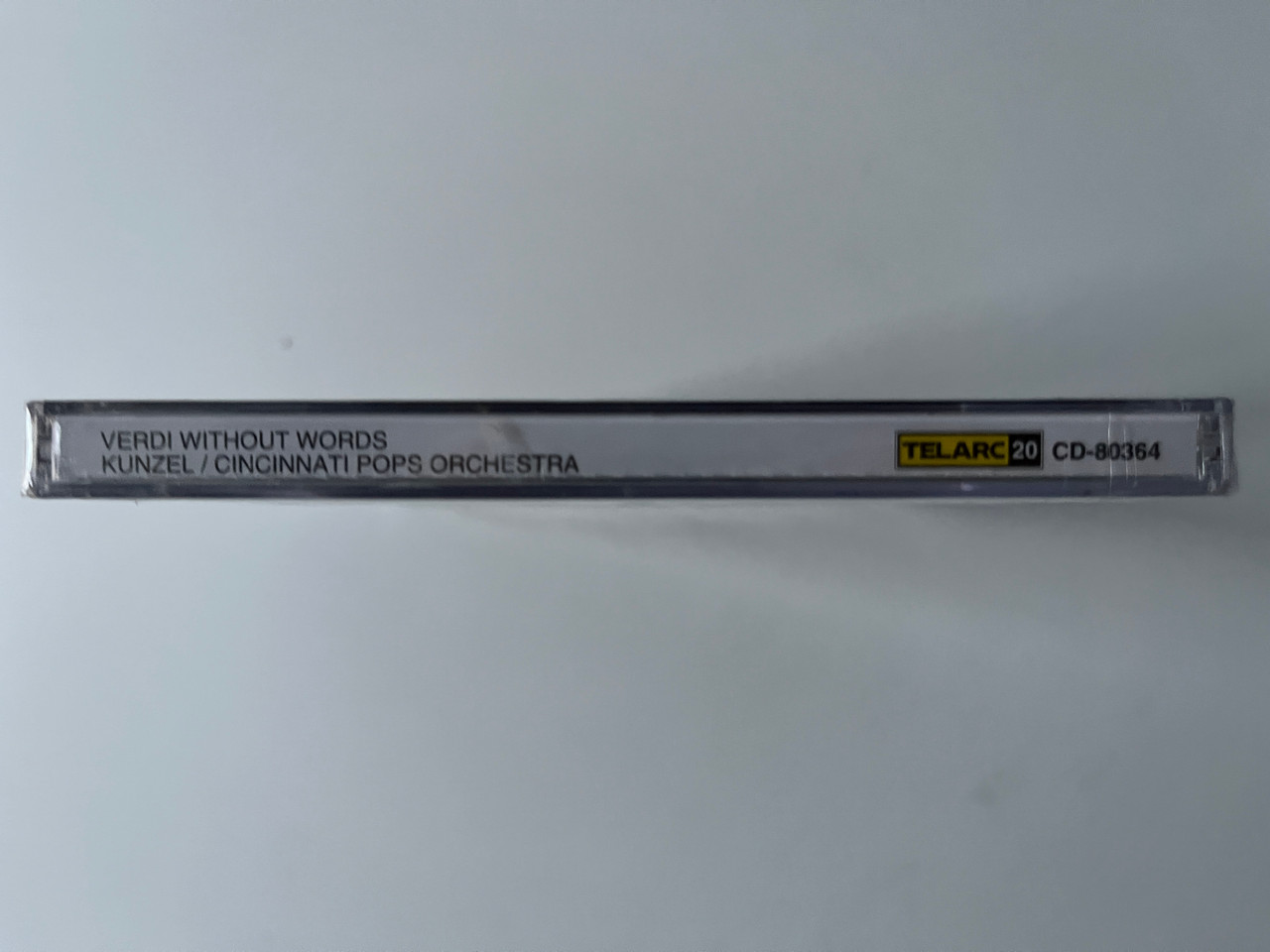 https://cdn10.bigcommerce.com/s-62bdpkt7pb/products/0/images/292154/Verdi_Without_Words_Grand_Opera_For_Orchestra_-_Erich_Kunzel_Cincinnati_Pops_Orchestra_Telarc_Audio_CD_1995_CD-80364_3__80149.1691571996.1280.1280.jpg?c=2&_gl=1*1hwzpm4*_ga*MjA2NTIxMjE2MC4xNTkwNTEyNTMy*_ga_WS2VZYPC6G*MTY5MTU3MDA2NS4xMDEzLjEuMTY5MTU3MTg0Ni4yNi4wLjA.