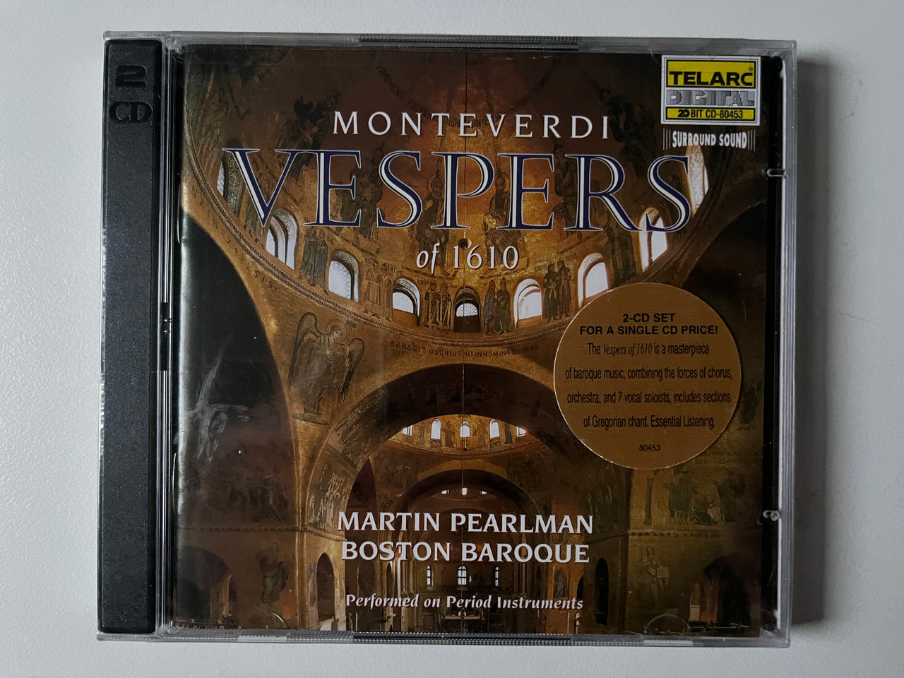 https://cdn10.bigcommerce.com/s-62bdpkt7pb/products/0/images/292157/Monteverdi_Vespers_Of_1610_-_Martin_Pearlman_Boston_Baroque_Performed_on_Period_Instruments_Telarc_2x_Audio_CD_1997_2CD-80453_1__97366.1691572925.1280.1280.jpg?c=2&_gl=1*18g3w59*_ga*MjA2NTIxMjE2MC4xNTkwNTEyNTMy*_ga_WS2VZYPC6G*MTY5MTU3MDA2NS4xMDEzLjEuMTY5MTU3MjYyNy4xNC4wLjA.