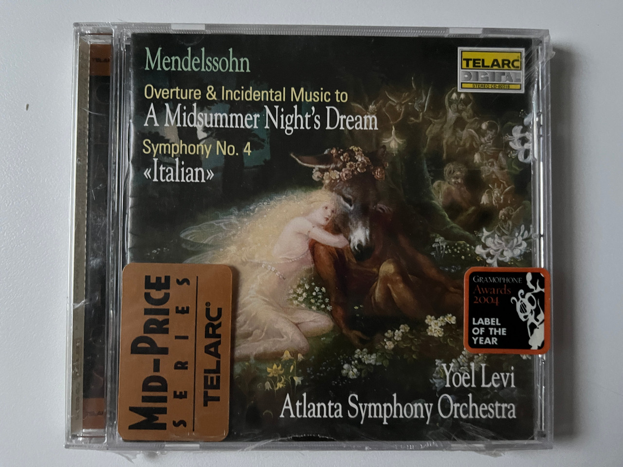 https://cdn10.bigcommerce.com/s-62bdpkt7pb/products/0/images/292160/Mendelssohn_-_Overture_Incidental_Music_To_A_Midsummer_Nights_Dream_Symphony_No._4_Italian_-_Yoel_Levi_Atlanta_Symphony_Orchestra_Telarc_Digital_Audio_CD_1992_CD-80318_1__56213.1691573355.1280.1280.jpg?c=2&_gl=1*12y5b54*_ga*MjA2NTIxMjE2MC4xNTkwNTEyNTMy*_ga_WS2VZYPC6G*MTY5MTU3MDA2NS4xMDEzLjEuMTY5MTU3MzEwOS41OC4wLjA.