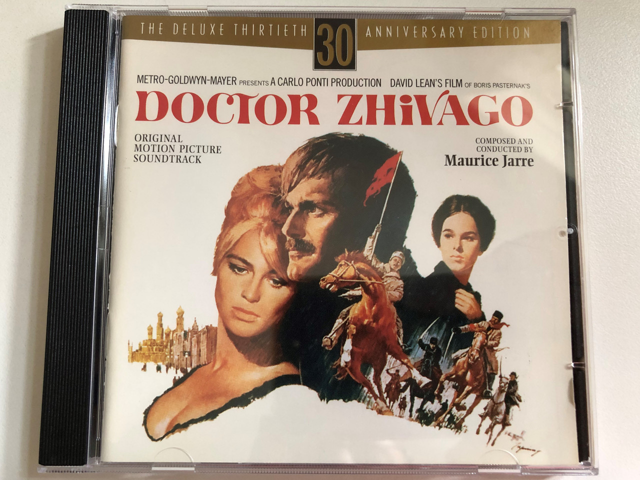 https://cdn10.bigcommerce.com/s-62bdpkt7pb/products/0/images/292526/Doctor_Zhivago_Original_Motion_Picture_Soundtrack_-_Composed_and_Conducted_By_Maurice_Jarre_The_Deluxe_Thirtieth_Anniversary_Edition_TCM_Turner_Classic_Movies_Music_Audio_CD_1995_R2_7195_1__11518.1691674001.1280.1280.JPG?c=2&_gl=1*1yhetll*_ga*MjA2NTIxMjE2MC4xNTkwNTEyNTMy*_ga_WS2VZYPC6G*MTY5MTY3MTE1OS4xMDE2LjEuMTY5MTY3MzY4My40NS4wLjA.