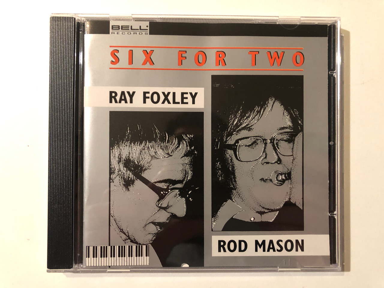 https://cdn10.bigcommerce.com/s-62bdpkt7pb/products/0/images/292559/Six_For_Two_-_Ray_Foxley_Rod_Mason_Bell_Records_Audio_CD_BLR_84_035_1__35048.1691676955.1280.1280.JPG?c=2&_gl=1*9vx5g0*_ga*MjA2NTIxMjE2MC4xNTkwNTEyNTMy*_ga_WS2VZYPC6G*MTY5MTY3MTE1OS4xMDE2LjEuMTY5MTY3Njk3NS42MC4wLjA.