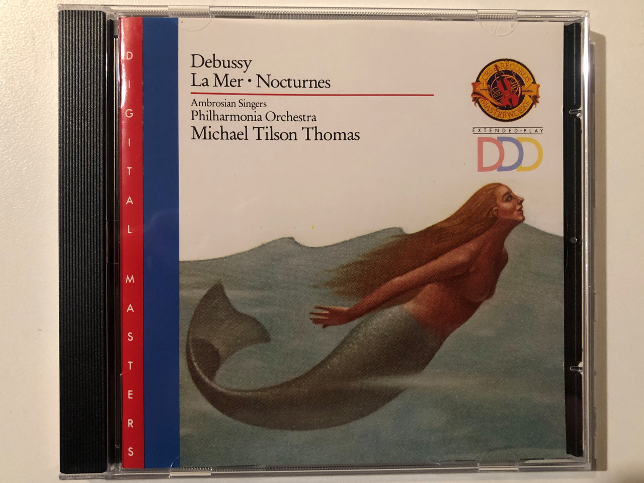 https://cdn10.bigcommerce.com/s-62bdpkt7pb/products/0/images/292617/Debussy_-_La_Mer_Nocturnes_-_Ambrosian_Singers_Philharmonia_Orchestra_Michael_Tilson_Thomas_Digital_Masters_CBS_Masterworks_Audio_CD_1988_MDK_44645_1__31197.1691729384.1280.1280.JPG?c=2&_gl=1*c4hhe3*_ga*MjA2NTIxMjE2MC4xNTkwNTEyNTMy*_ga_WS2VZYPC6G*MTY5MTcyNjMyMS4xMDE3LjEuMTY5MTcyOTI2NC41Mi4wLjA.