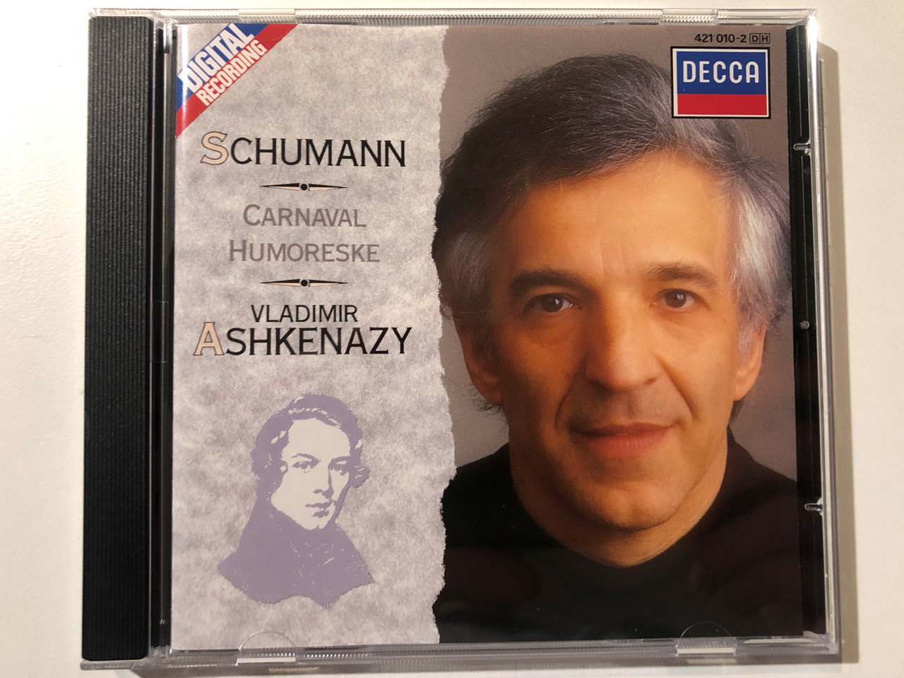 https://cdn10.bigcommerce.com/s-62bdpkt7pb/products/0/images/292626/Schumann_-_Carnaval_Humoreske_-_Vladimir_Ashkenazy_Decca_Audio_CD_1988_421_010-2_1__21070.1691730196.1280.1280.JPG?c=2&_gl=1*1mxhq5p*_ga*MjA2NTIxMjE2MC4xNTkwNTEyNTMy*_ga_WS2VZYPC6G*MTY5MTcyNjMyMS4xMDE3LjEuMTY5MTczMDIwNi42MC4wLjA.