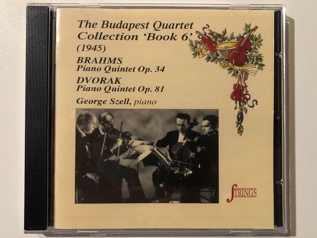 https://cdn10.bigcommerce.com/s-62bdpkt7pb/products/0/images/292687/The_Budapest_Quartet_1945_Collection_Book_6_1945_Brahms_-_Piano_Quintet_Op.34_Dvorak_-_Piano_Quintet_Op.81_-_George_Szell_piano_Strings_Audio_CD_1997_QT_99-327__18931.1691736154.1280.1280.JPG?c=2&_gl=1*g60xj4*_ga*MjA2NTIxMjE2MC4xNTkwNTEyNTMy*_ga_WS2VZYPC6G*MTY5MTcyNjMyMS4xMDE3LjEuMTY5MTczNTk5My41My4wLjA.