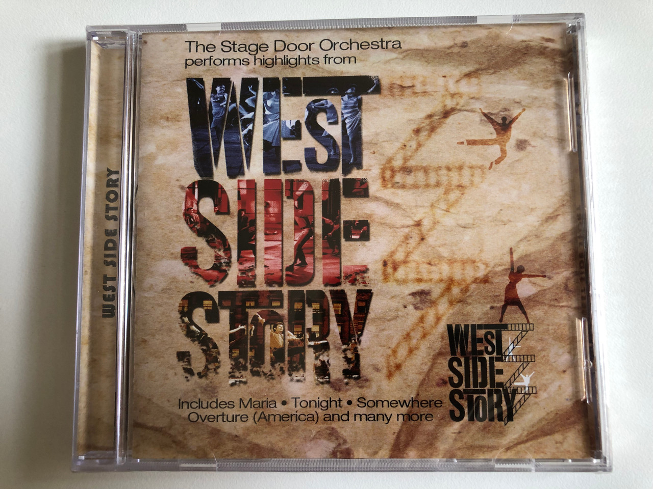 https://cdn10.bigcommerce.com/s-62bdpkt7pb/products/0/images/292763/The_Stage_Door_Orchestra_Performs_highlights_from_West_Side_Story_-_Includes_Maria_Tonight_Somewhere_Overture_America_and_many_more_Cedar_Audio_CD_GFS218_1__50165.1691766943.1280.1280.JPG?c=2&_gl=1*1rp9es*_ga*MjA2NTIxMjE2MC4xNTkwNTEyNTMy*_ga_WS2VZYPC6G*MTY5MTc2NTI1MS4xMDE4LjEuMTY5MTc2NjY0Ni4zOS4wLjA.