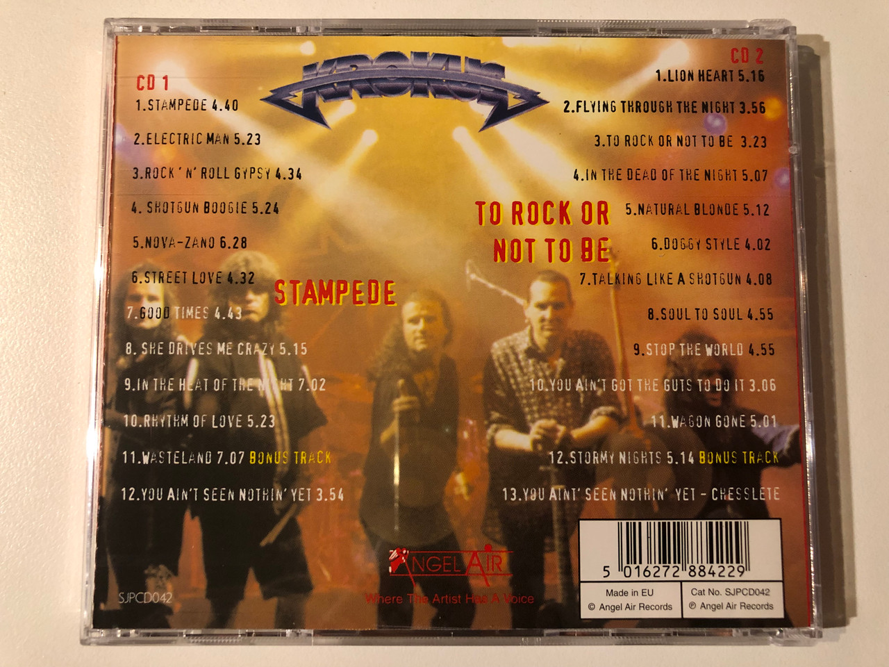 https://cdn10.bigcommerce.com/s-62bdpkt7pb/products/0/images/293186/Krokus_Stampede_To_Rock_Or_Not_To_Be_Angel_Air_Records_2x_Audio_CD_SJPCD042_2__03835.1692075420.1280.1280.JPG?c=2&_gl=1*1bkrg25*_ga*MjA2NTIxMjE2MC4xNTkwNTEyNTMy*_ga_WS2VZYPC6G*MTY5MjA3Mzc1NC4xMDIyLjEuMTY5MjA3NTE5OS40Ny4wLjA.