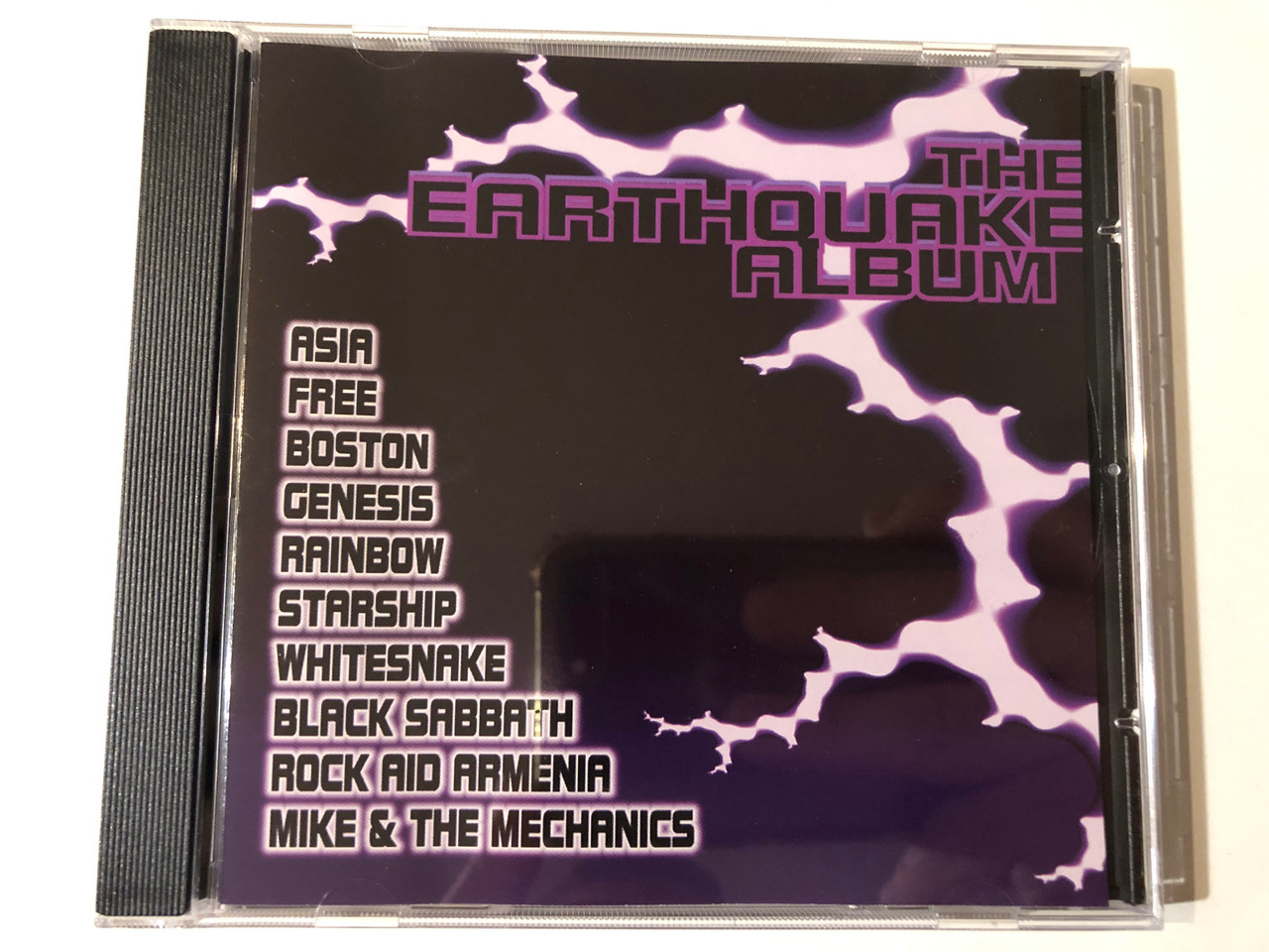 https://cdn10.bigcommerce.com/s-62bdpkt7pb/products/0/images/293197/The_Earthquake_Album_-_Asia_Free_Boston_Genesis_Rainbow_Starship_Whitesnake_Black_Sabbath_Rock_And_Armenia_Mike_The_Mechanics_Aardvark_Audio_CD_1996_ANT010_1__14579.1692076805.1280.1280.JPG?c=2&_gl=1*1ngtjwr*_ga*MjA2NTIxMjE2MC4xNTkwNTEyNTMy*_ga_WS2VZYPC6G*MTY5MjA3Mzc1NC4xMDIyLjEuMTY5MjA3NjY1MC40Ni4wLjA.