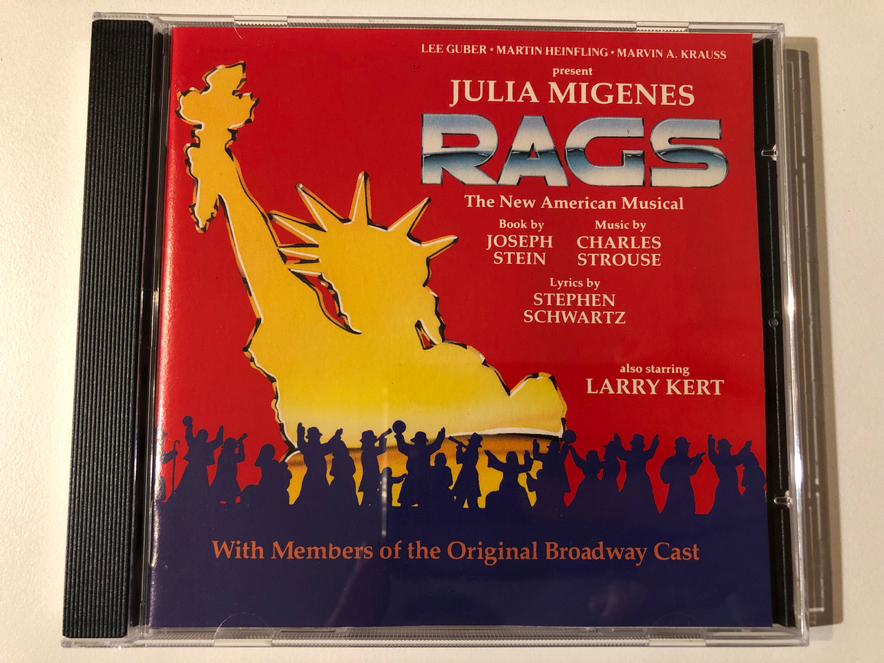 https://cdn10.bigcommerce.com/s-62bdpkt7pb/products/0/images/293280/Lee_Guber_Martin_Heinfling_Mavin_A._Krauss_present_Julia_Migenes_-_Rags_The_New_American_Musical_Book_by_Joseph_Stein_Music_by_Charles_Strouse_Lyrics_by_Stephen_Schwartz_also_starring_1__27642.1692092655.1280.1280.JPG?c=2&_gl=1*xniuqz*_ga*MjA2NTIxMjE2MC4xNTkwNTEyNTMy*_ga_WS2VZYPC6G*MTY5MjA4OTM2OC4xMDIzLjEuMTY5MjA5MjMwNy40My4wLjA.