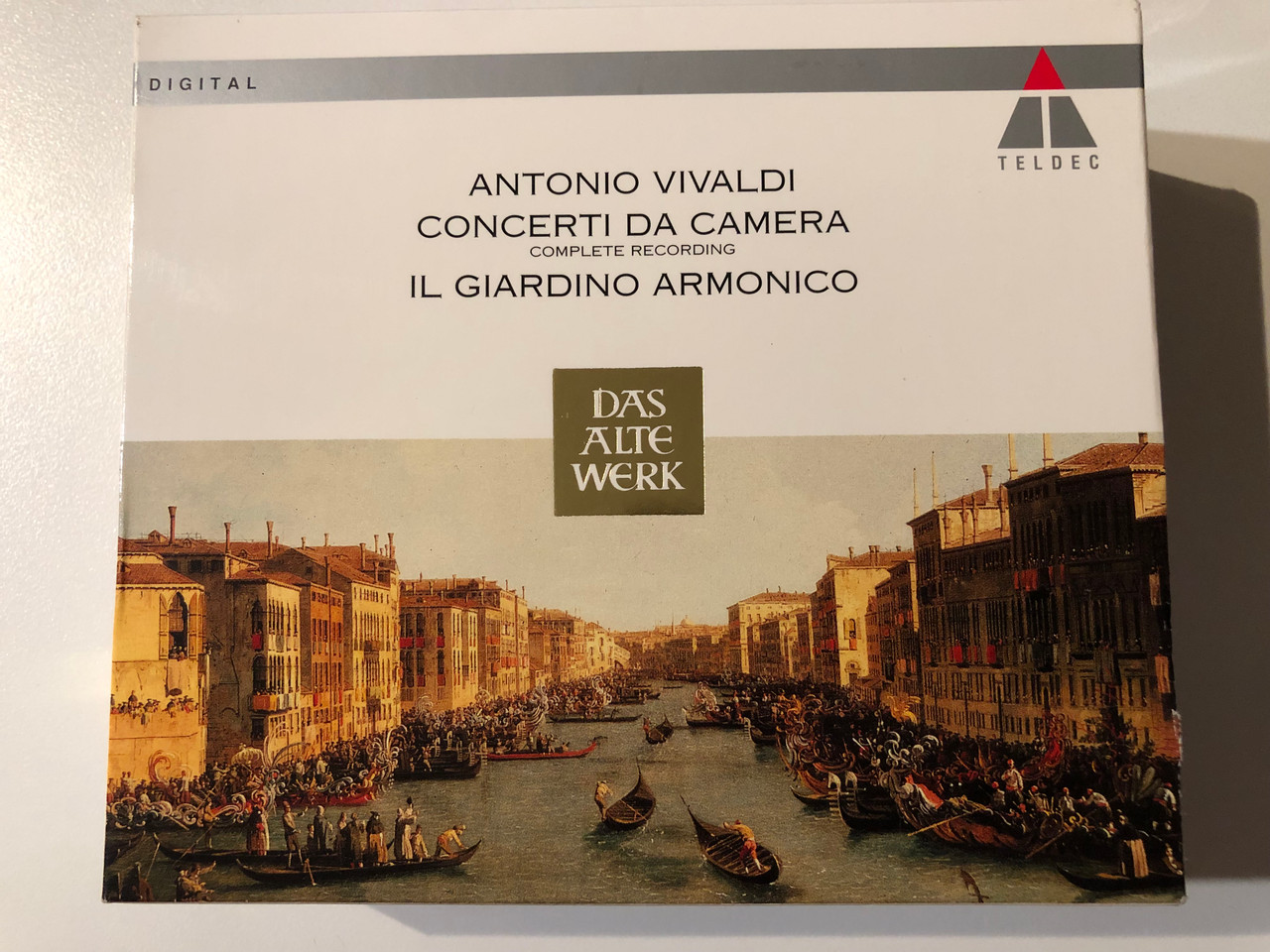 https://cdn10.bigcommerce.com/s-62bdpkt7pb/products/0/images/293713/Antonio_Vivaldi_Concerti_Da_Camera_Complete_Recording_-_Il_Giardino_Armonico_Das_Alte_Werk_Teldec_4x_Audio_CD_Box_Set_9031-77040-2_1__90153.1692192261.1280.1280.JPG?c=2&_gl=1*1x9ekb9*_ga*MjA2NTIxMjE2MC4xNTkwNTEyNTMy*_ga_WS2VZYPC6G*MTY5MjE4OTA1NS4xMDMwLjEuMTY5MjE5MjI2My42MC4wLjA.